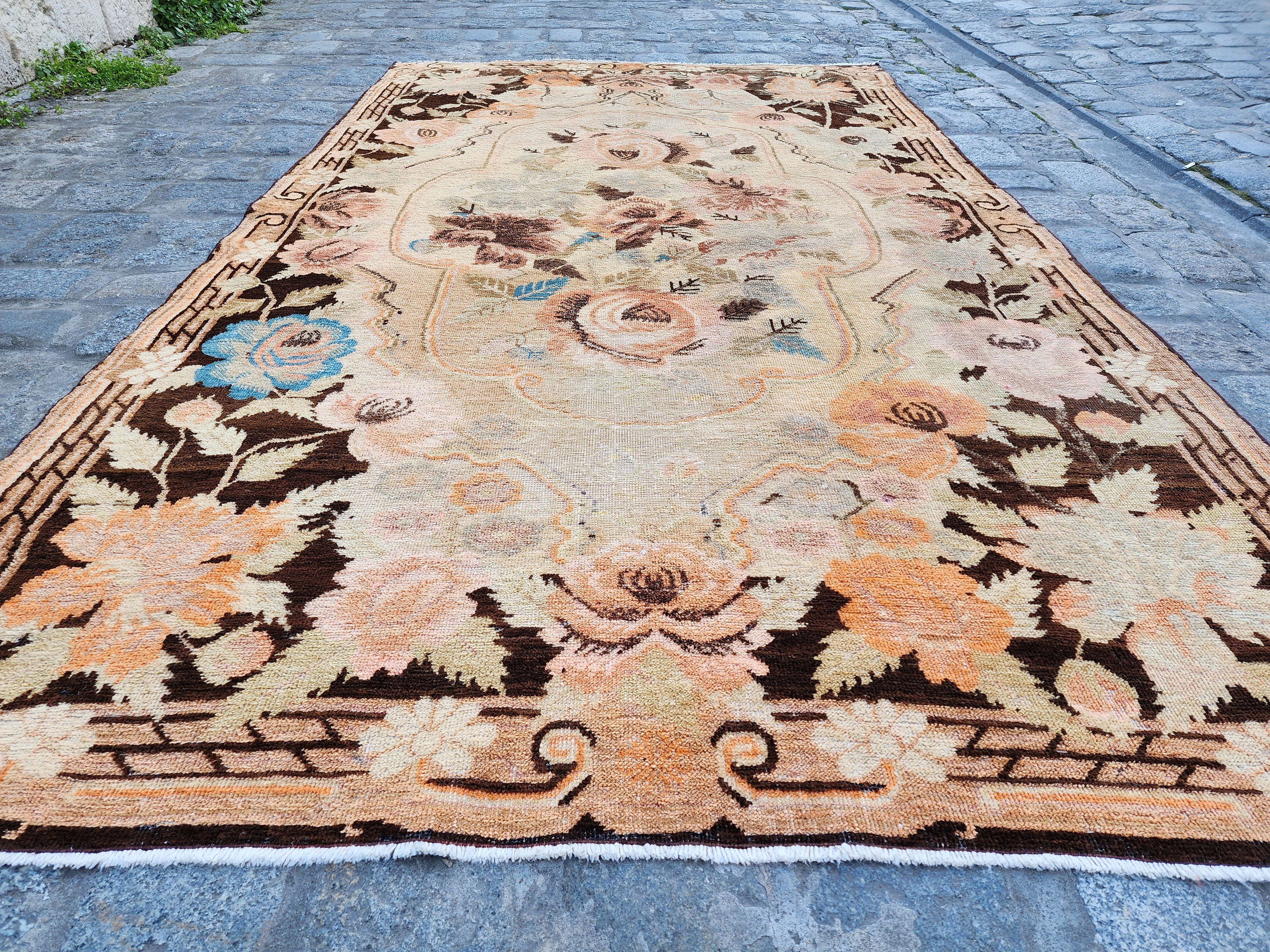 antique Turkish Area Rug — styled view