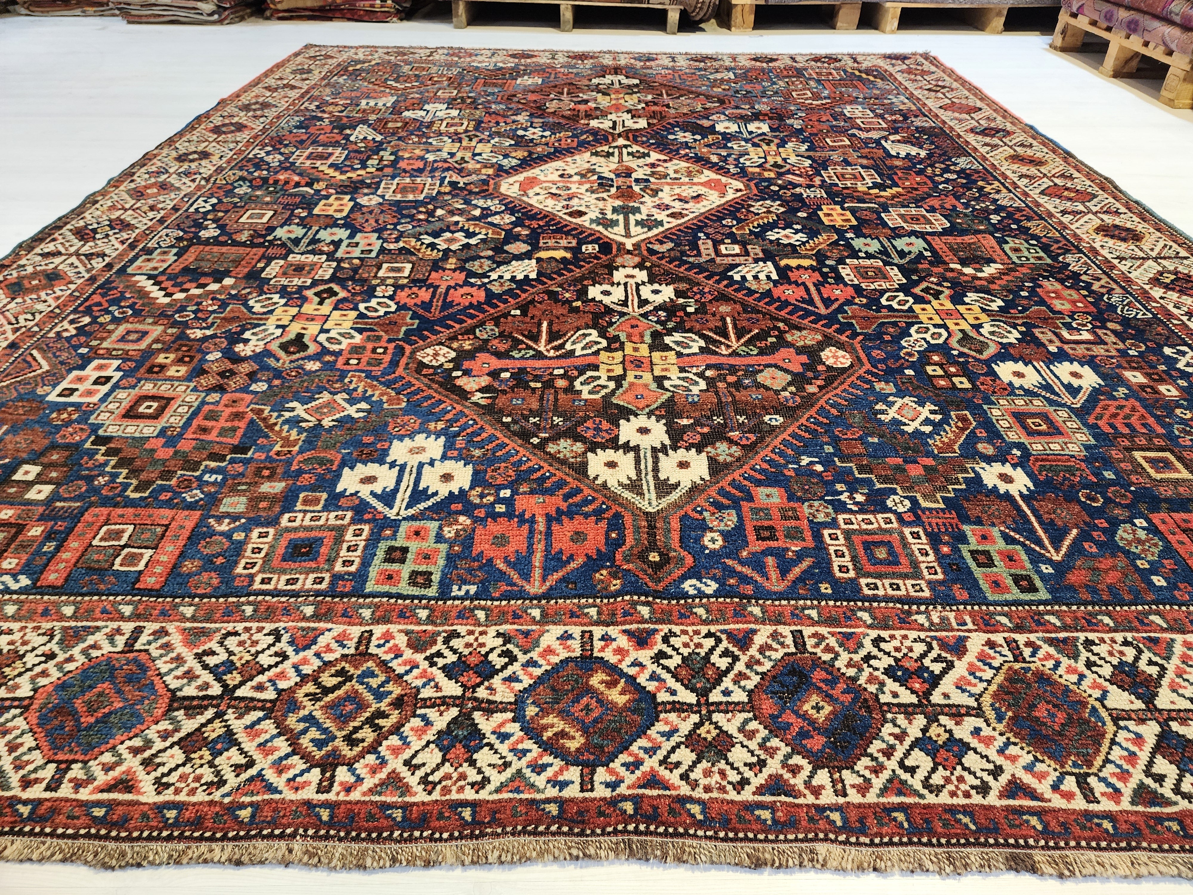 antique Caucasian Shirvan Wool Large Area Rug — styled view