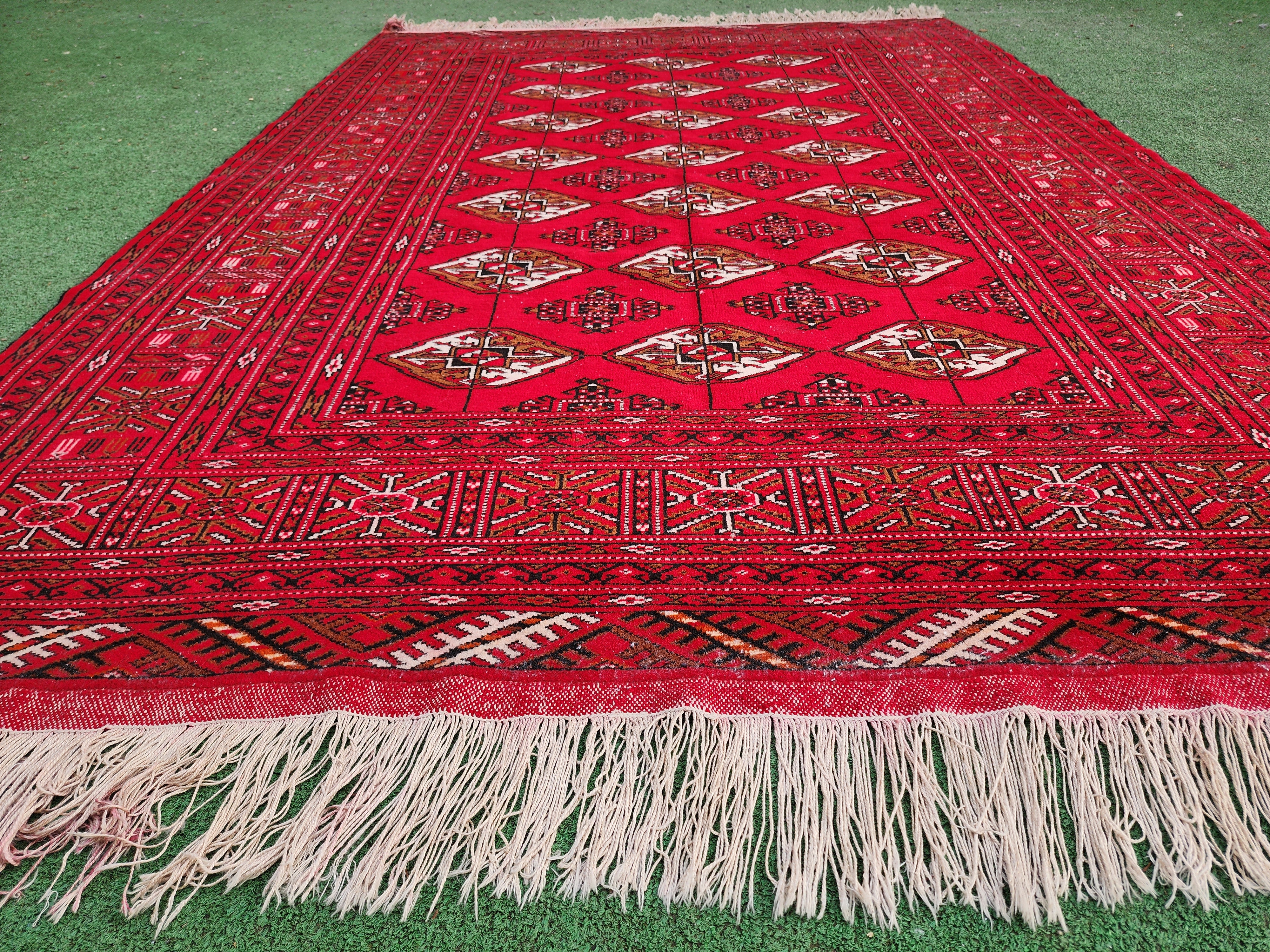 Vibrant Red Turcoman Rug with Geometric Motifs, 6 ft 8 in x 4 ft 8 in