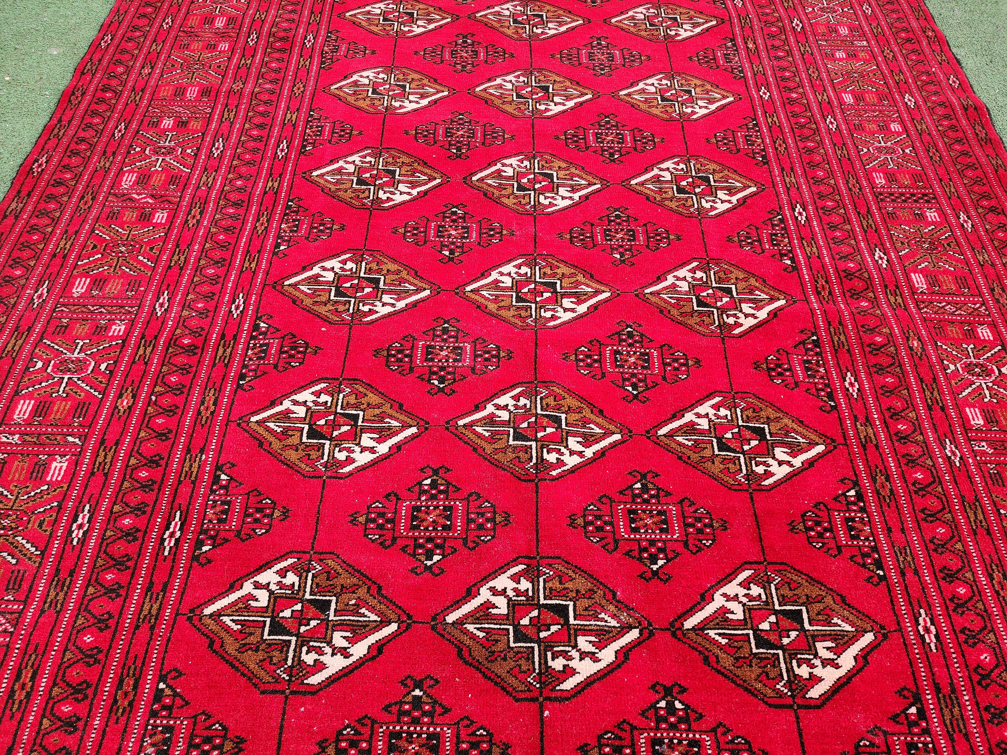 Vibrant Red Turcoman Rug with Geometric Motifs, 6 ft 8 in x 4 ft 8 in