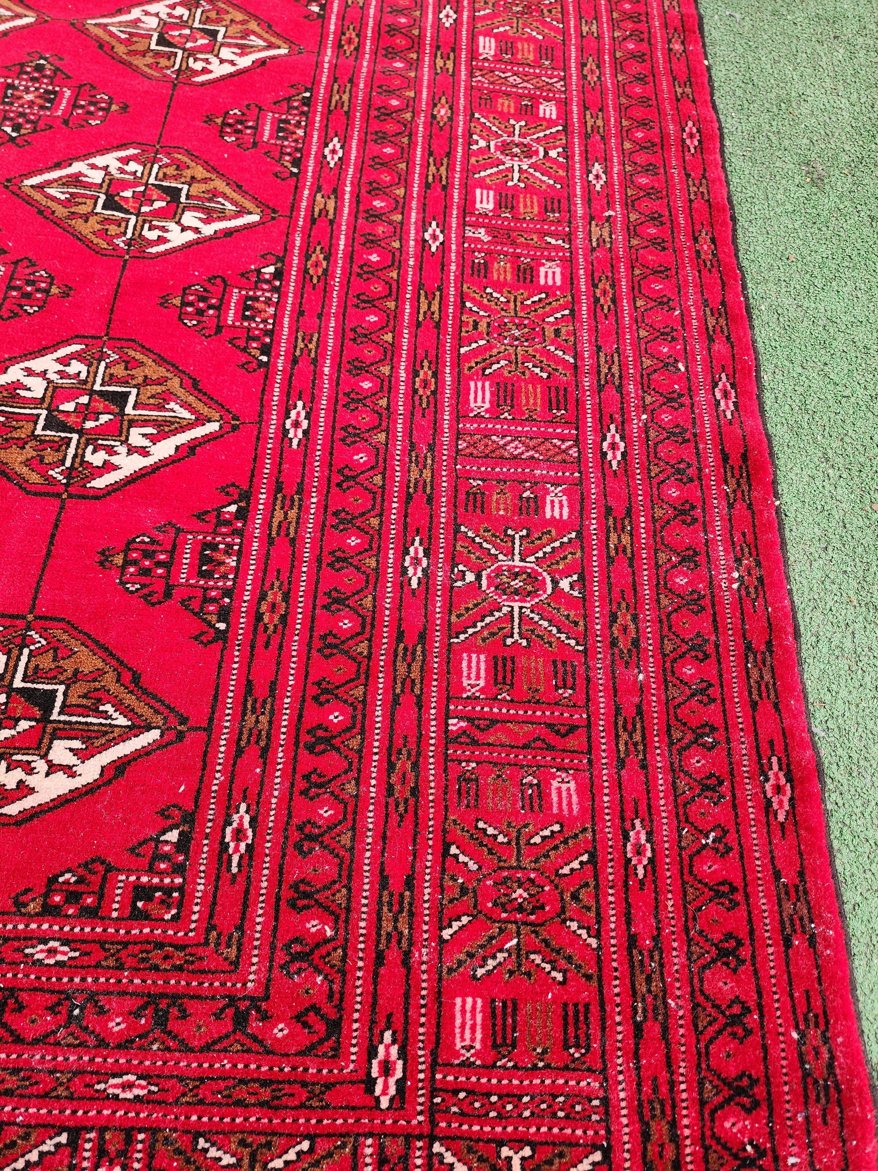 Vibrant Red Turcoman Rug with Geometric Motifs, 6 ft 8 in x 4 ft 8 in
