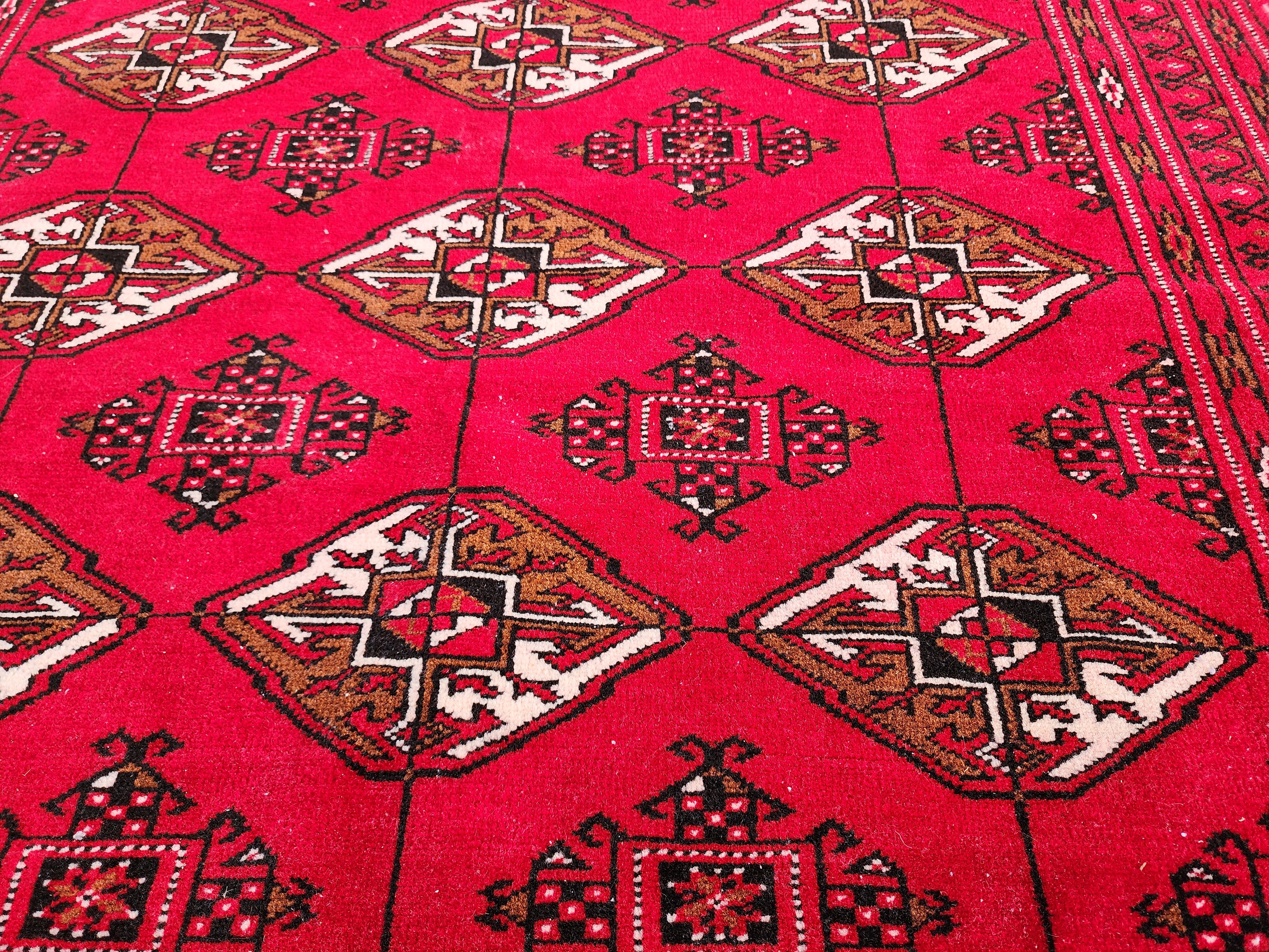 Vibrant Red Turcoman Rug with Geometric Motifs, 6 ft 8 in x 4 ft 8 in