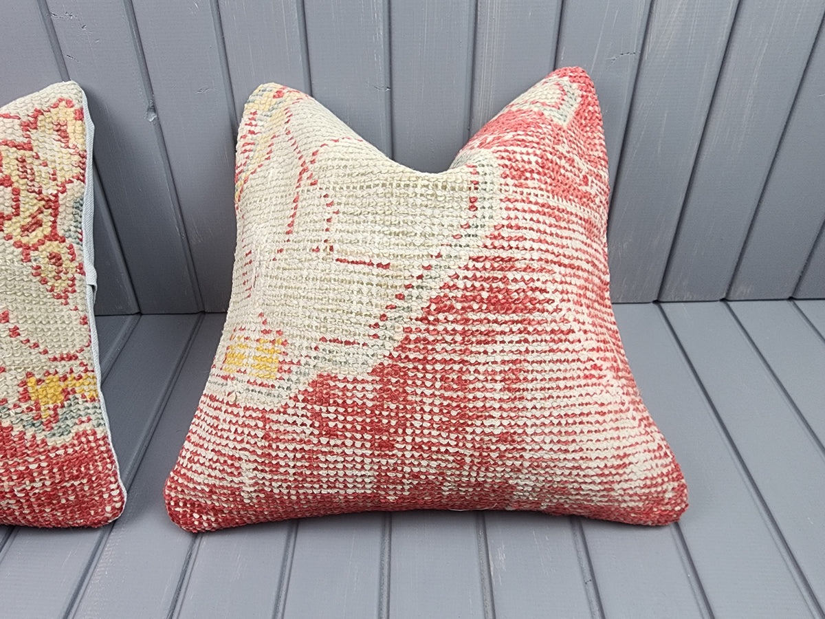 Antique Oushak rug pillow covers, set of 2, red and ivory, 16x16 in, single cover close-up
