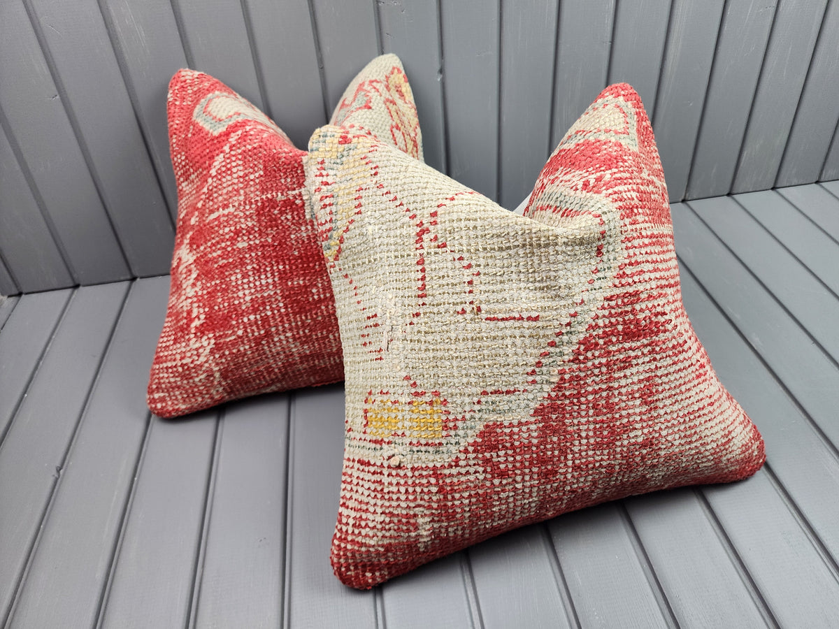 Antique Oushak rug pillow covers, set of 2, red and ivory, 16x16 in, pair, side view