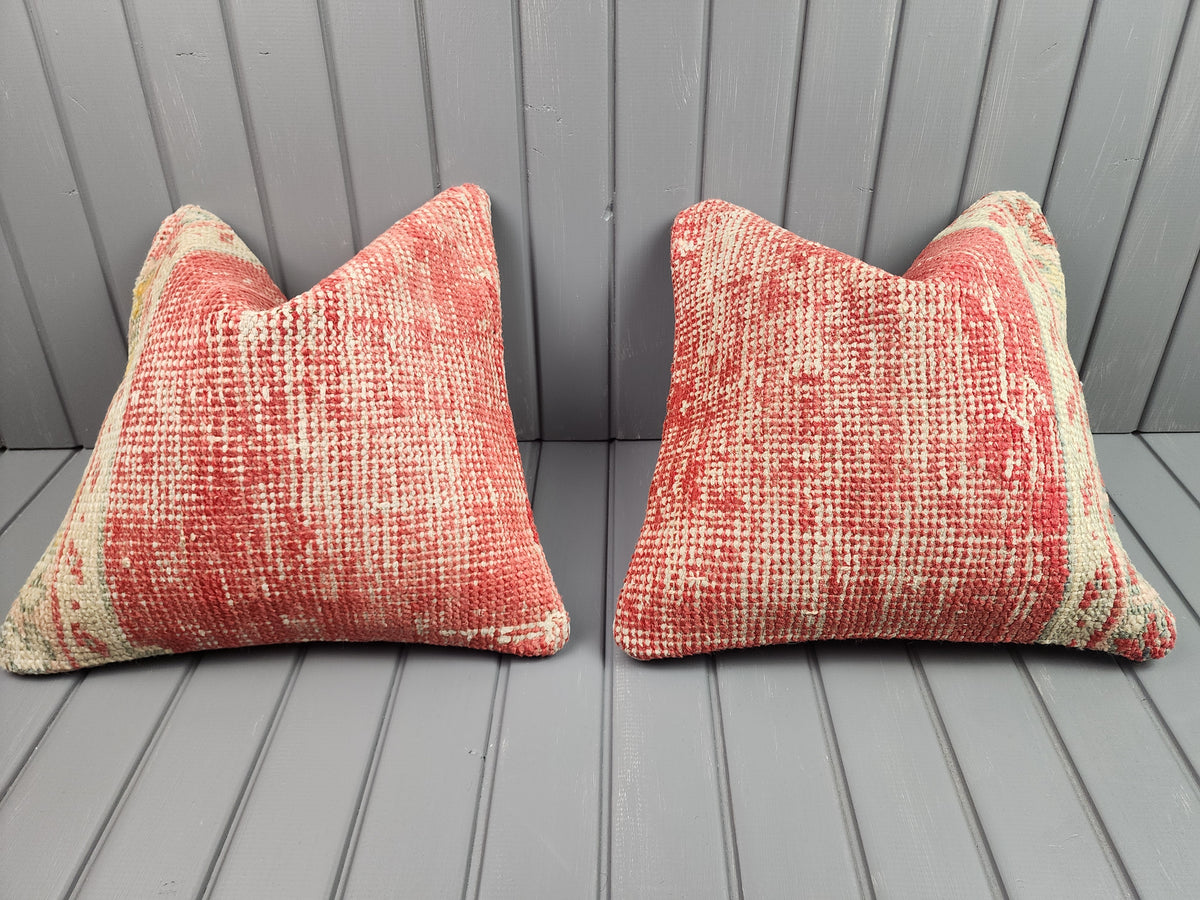 Antique Oushak rug pillow covers, set of 2, red and ivory, 16x16 in, pair, front view