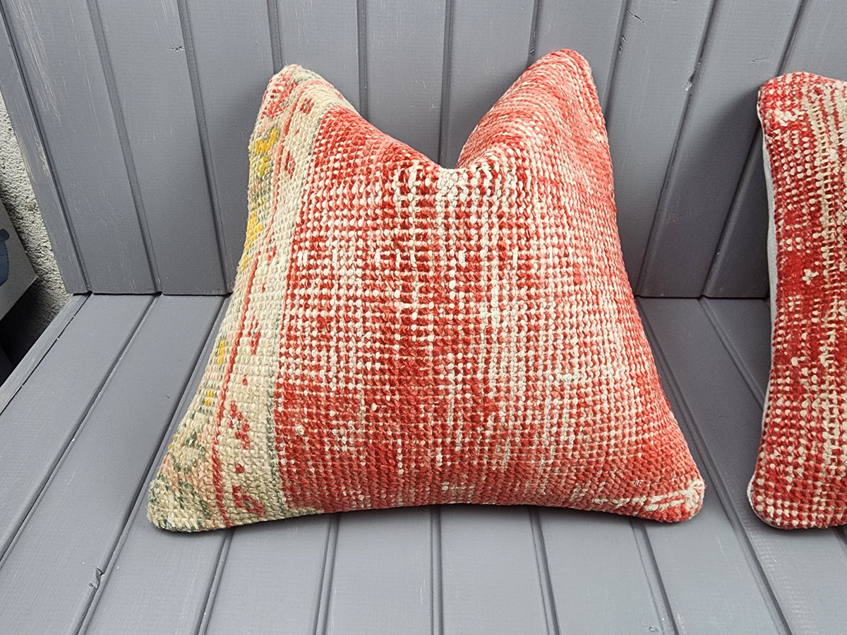 Antique Oushak rug pillow covers, set of 2, red and ivory, 16x16 in, single cover close-up