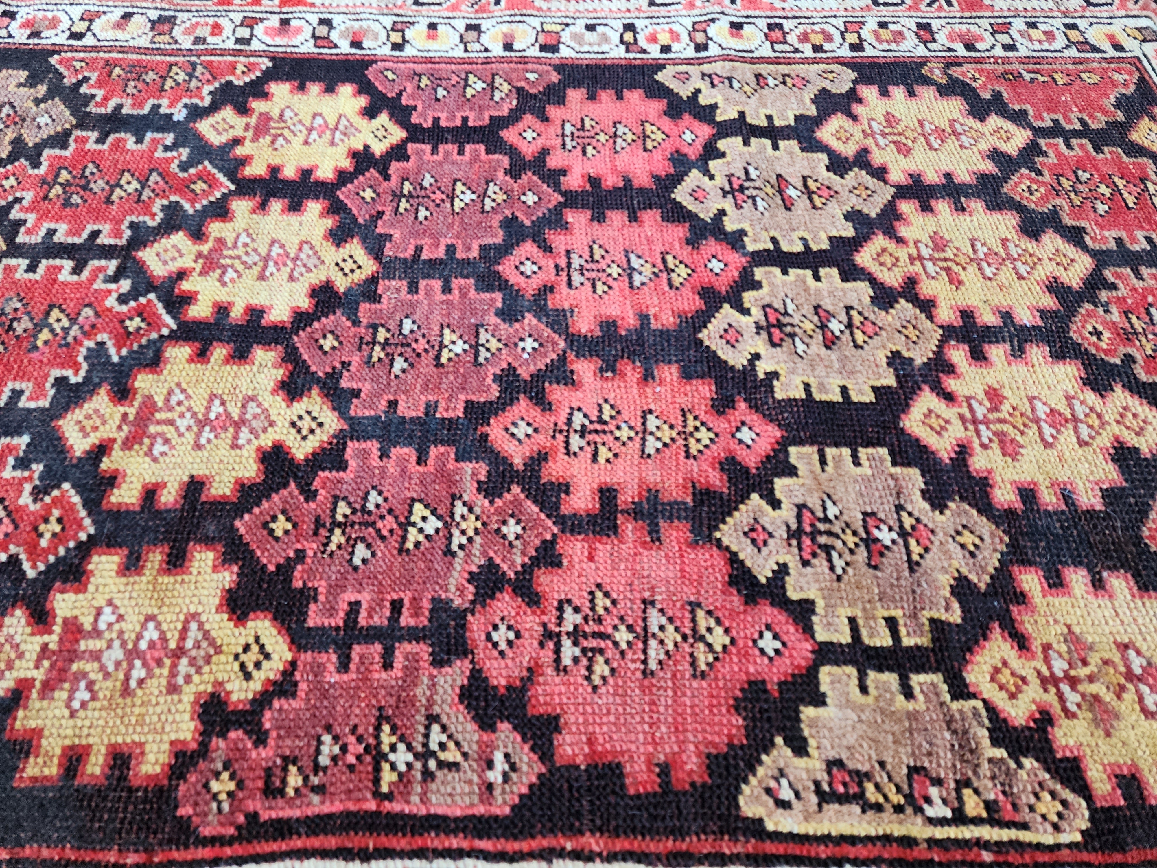 antique Caucasian Wool Area Rug — colour close-up