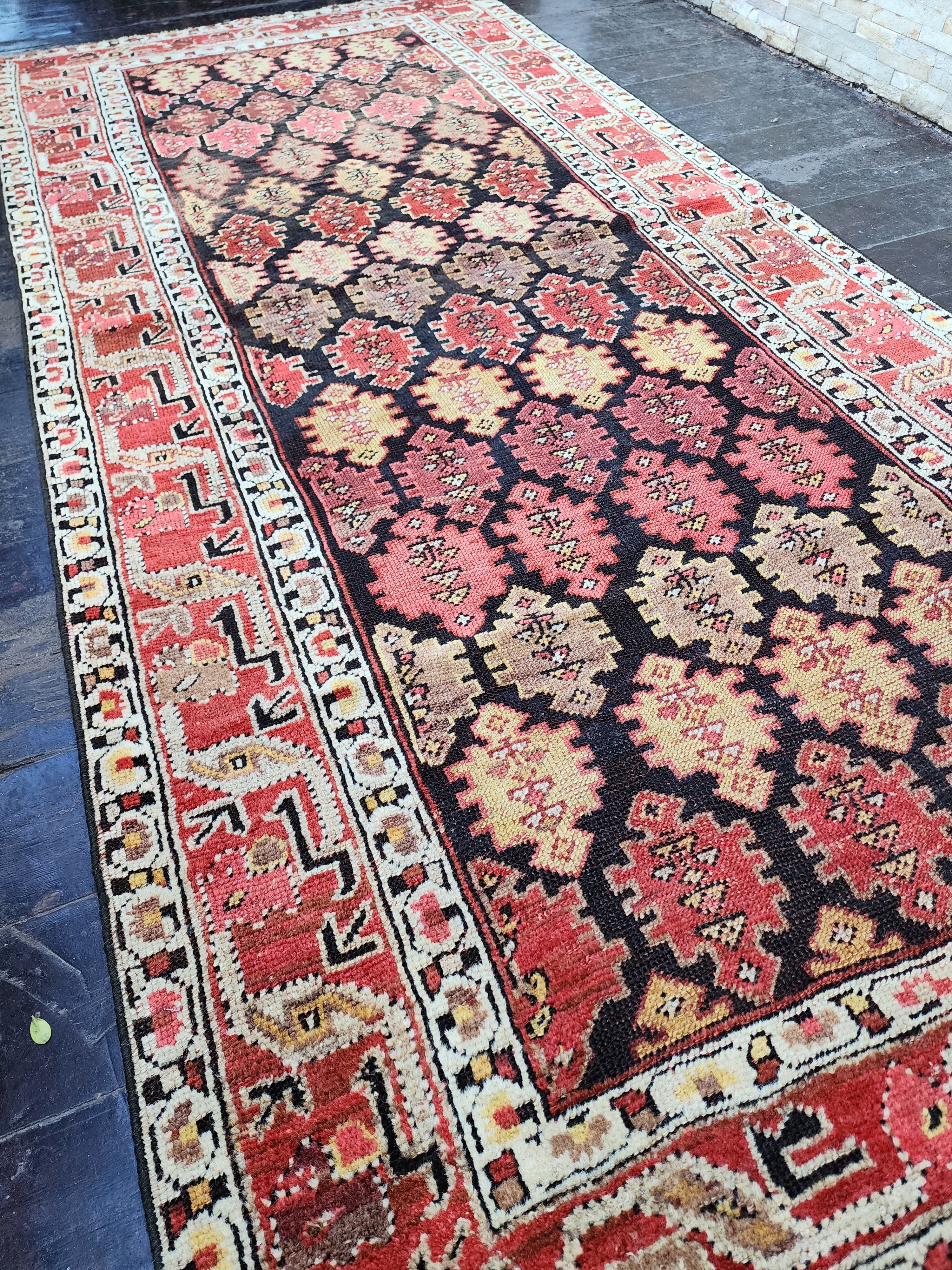 antique Caucasian Wool Area Rug — back view