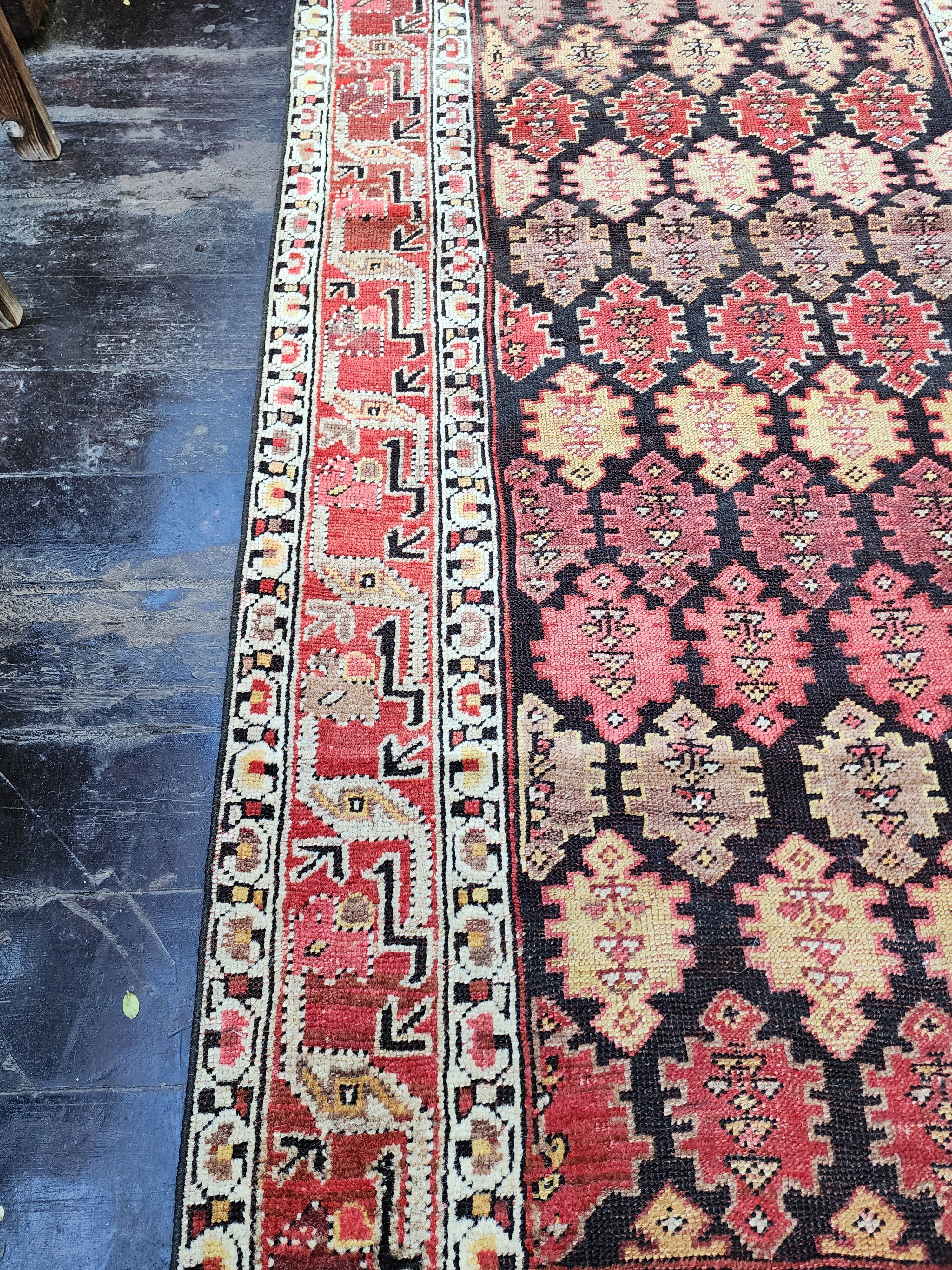 antique Caucasian Wool Area Rug — corner detail
