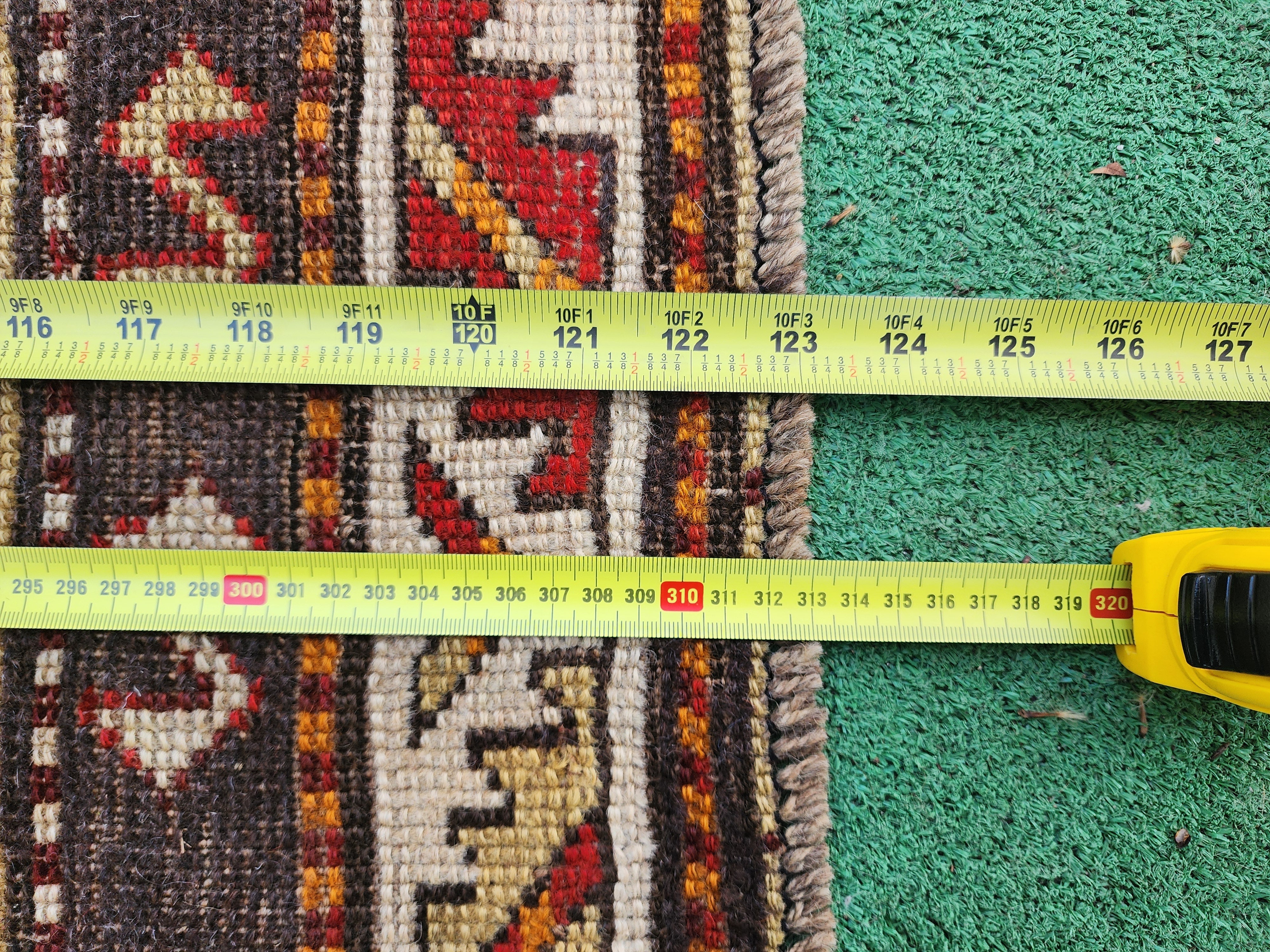 antique Caucasian Wool Runner Rug — styled view
