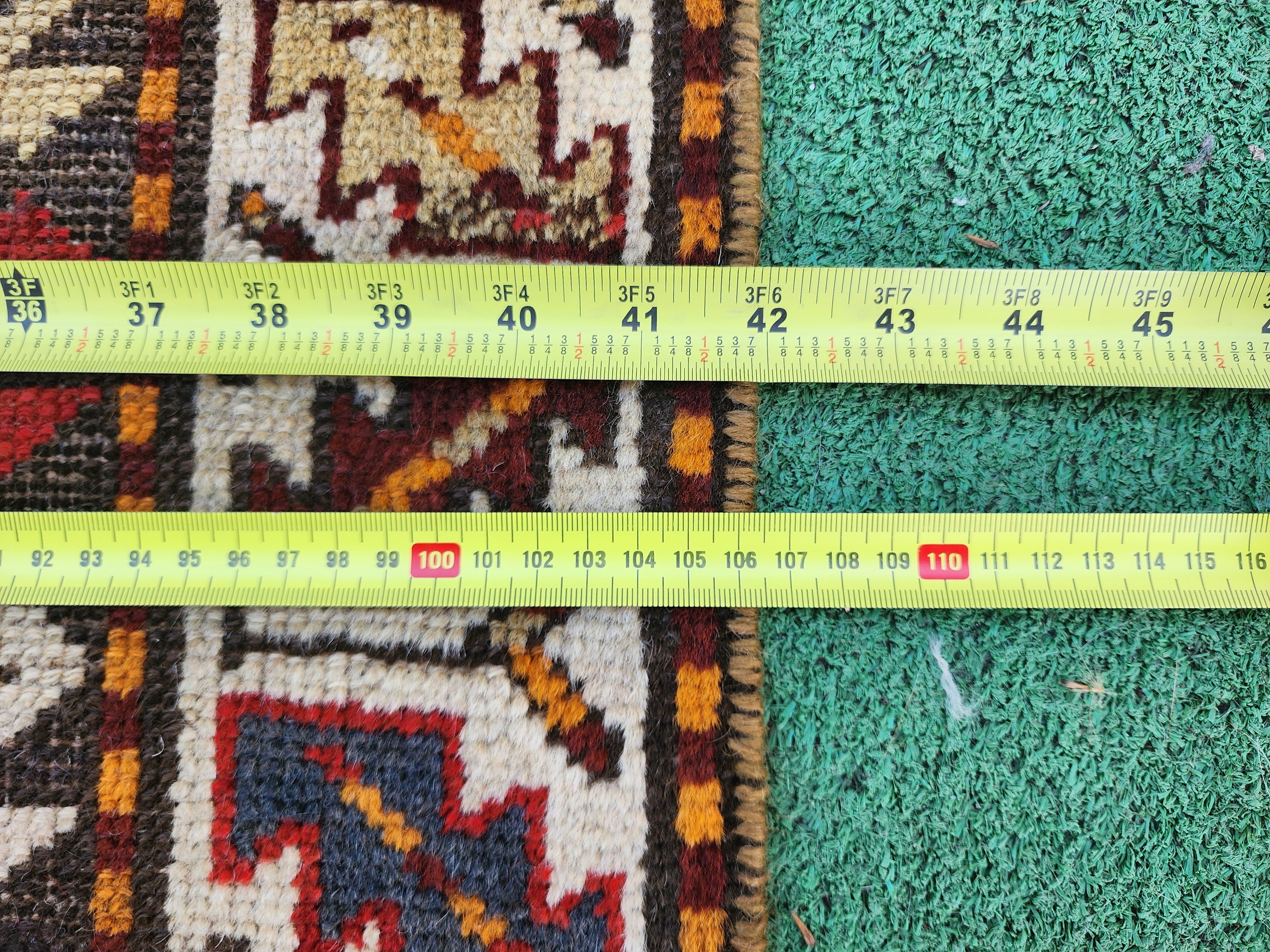antique Caucasian Wool Runner Rug — styled view