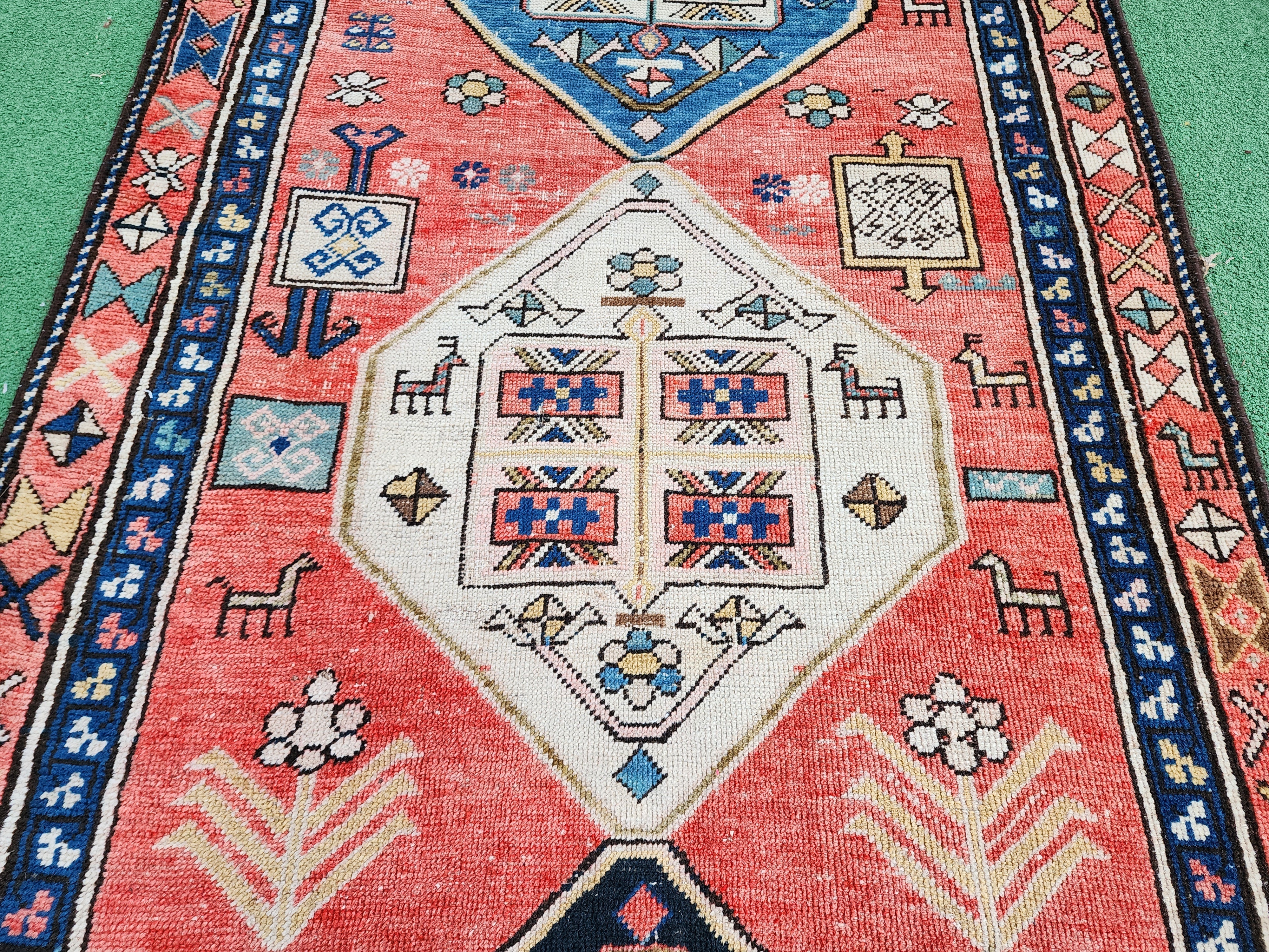 antique Caucasian Runner Rug — styled view