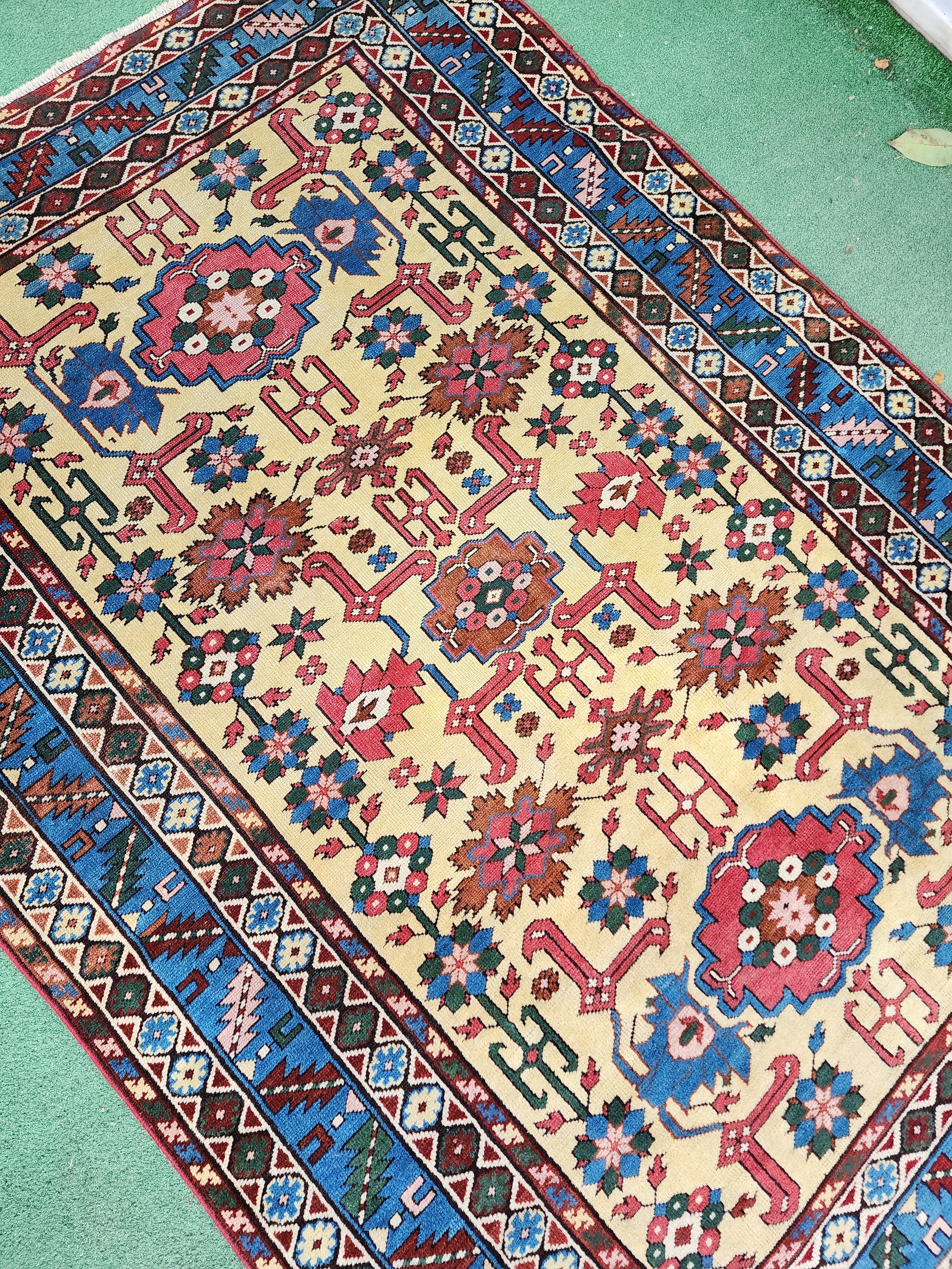 antique Caucasian Shirvan Wool Small Rug — in setting
