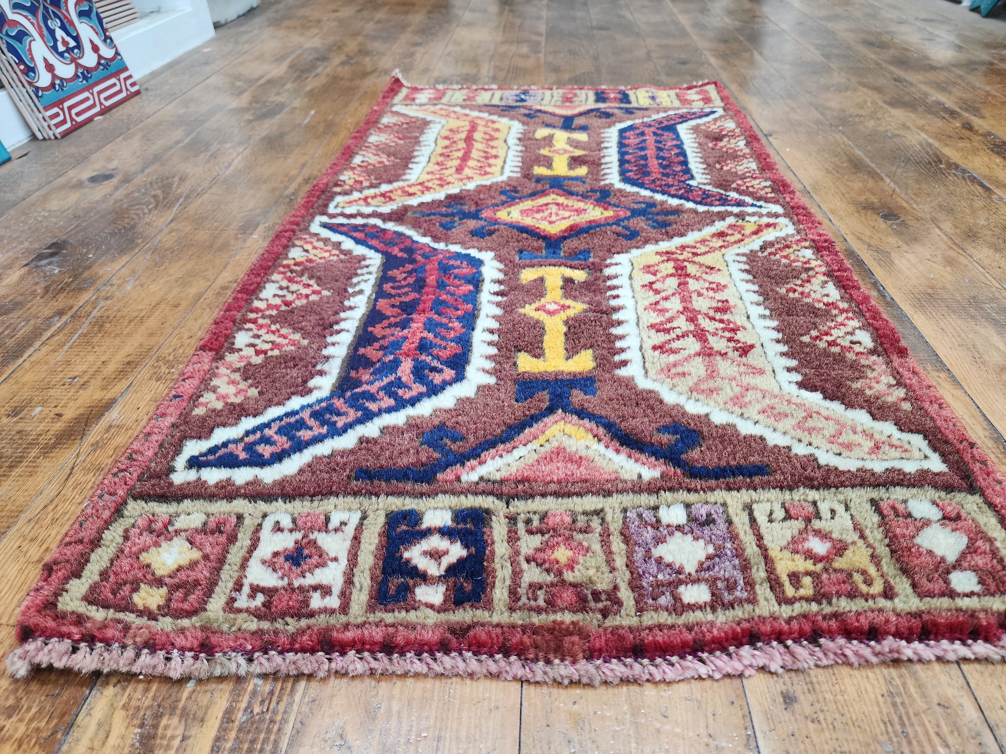 antique Konya Wool Small Rug — in setting