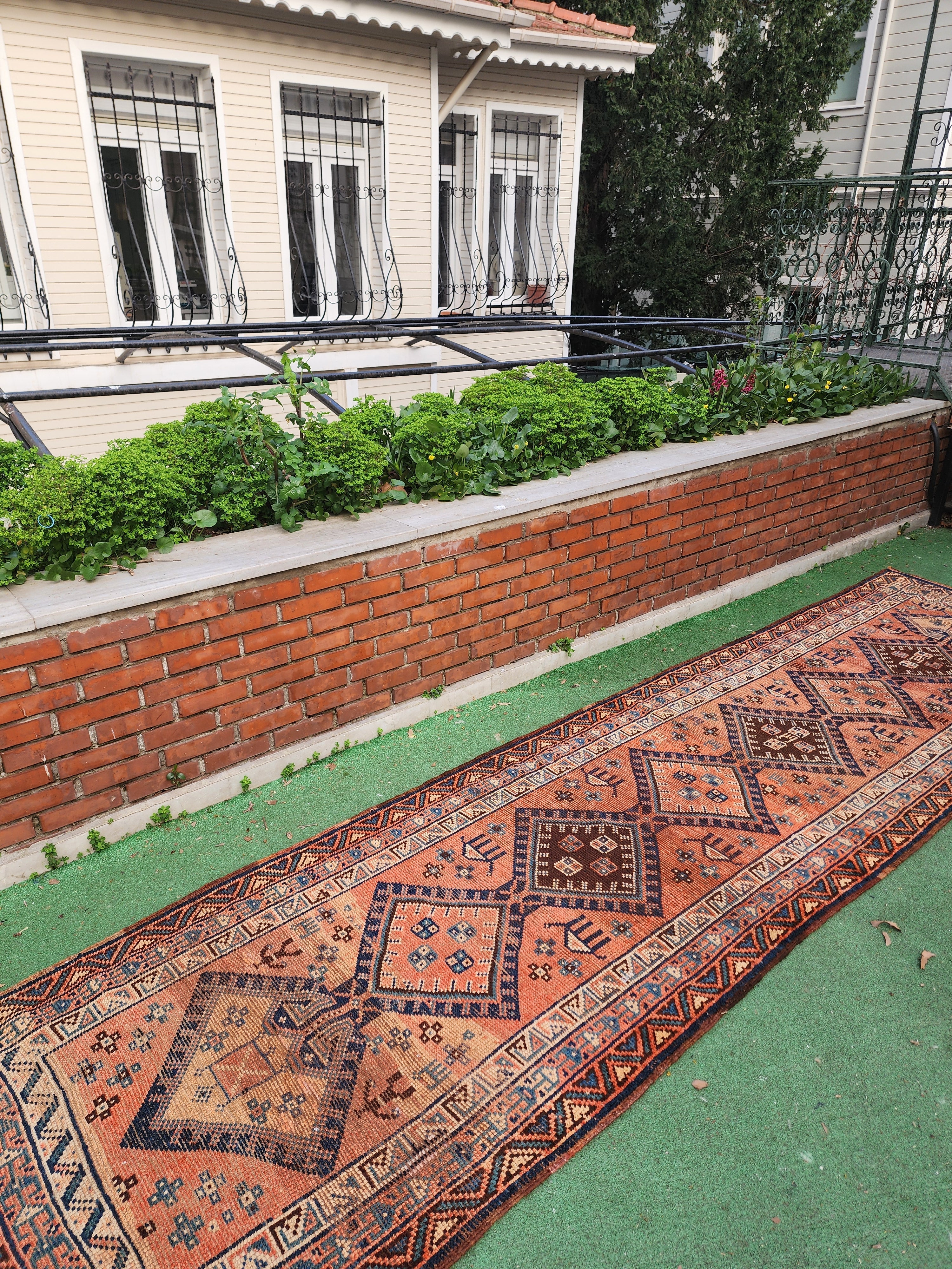 antique Persian Wool Runner Rug — styled view