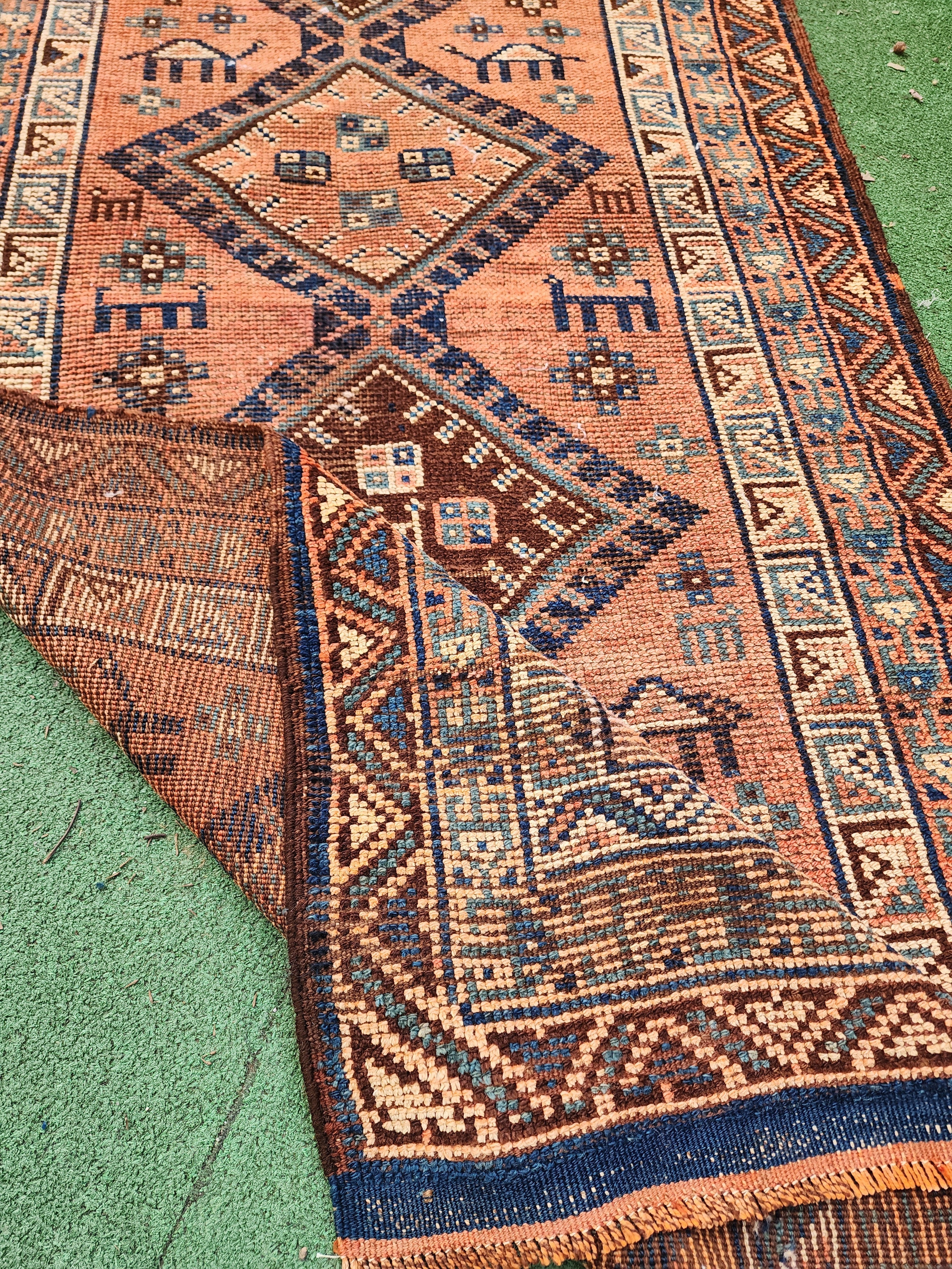 antique Persian Wool Runner Rug — styled view