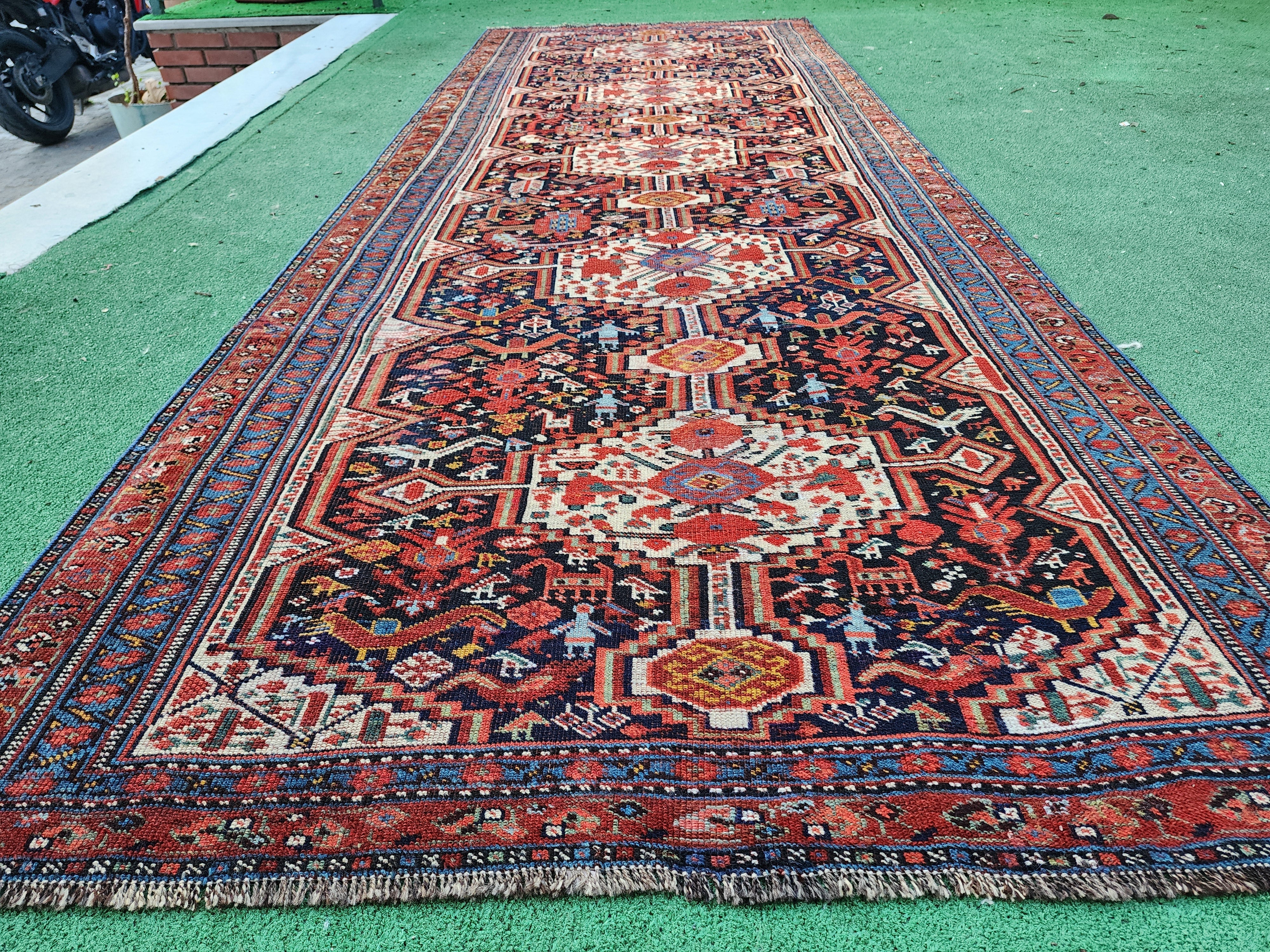 antique Persian Qashqai Runner Rug — styled view