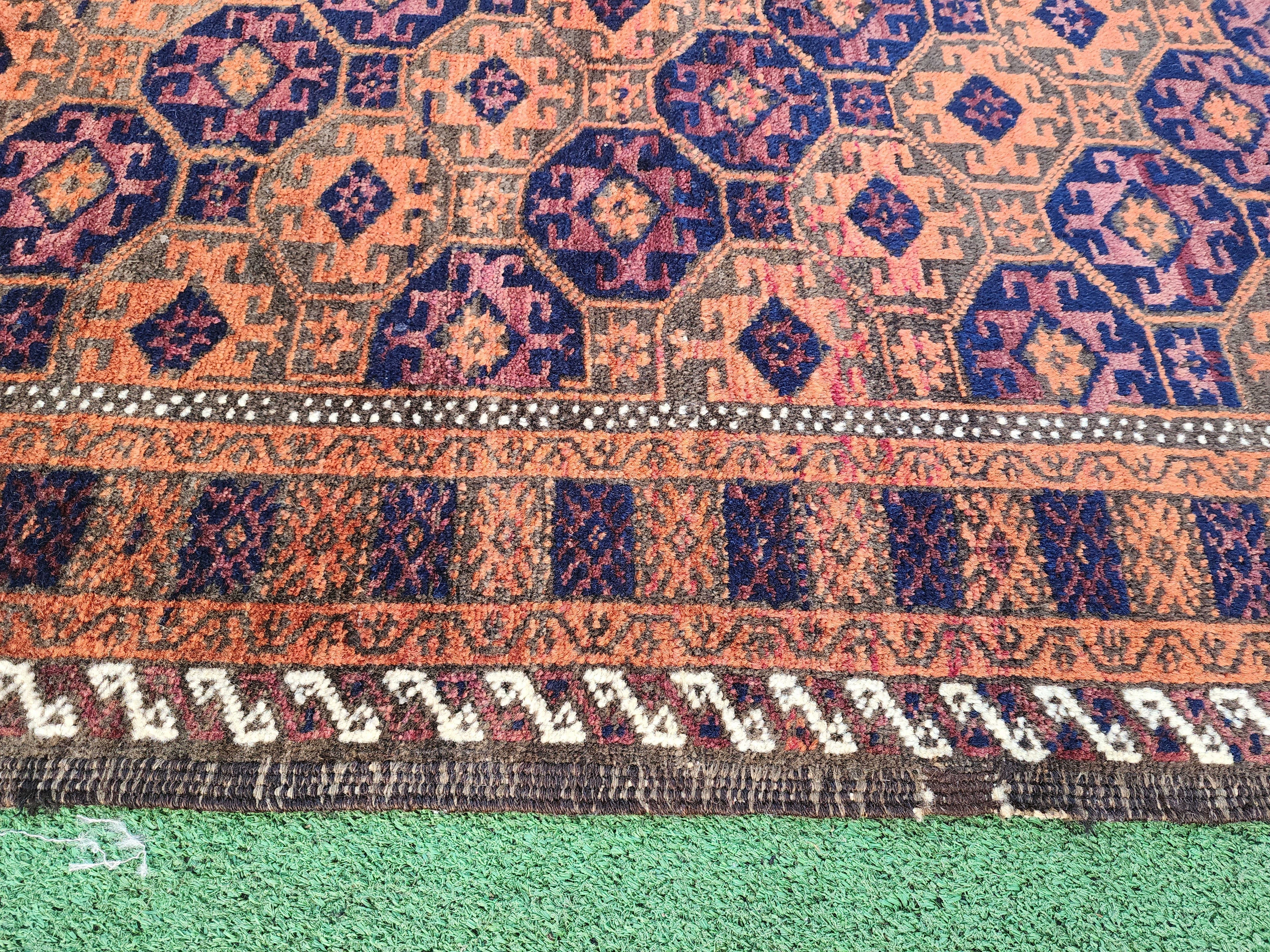 antique Baluchi Area Rug — corner detail