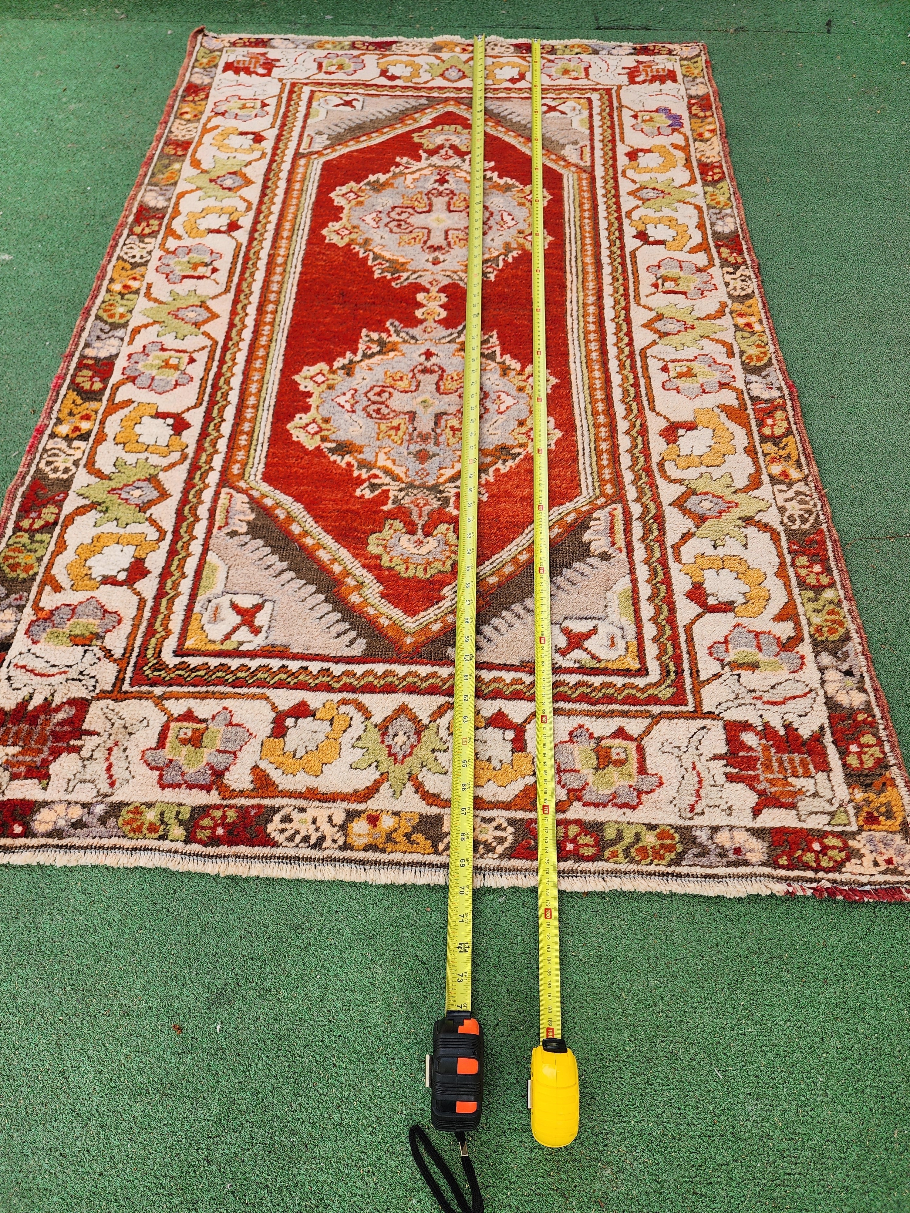 antique Milas Small Rug — styled view