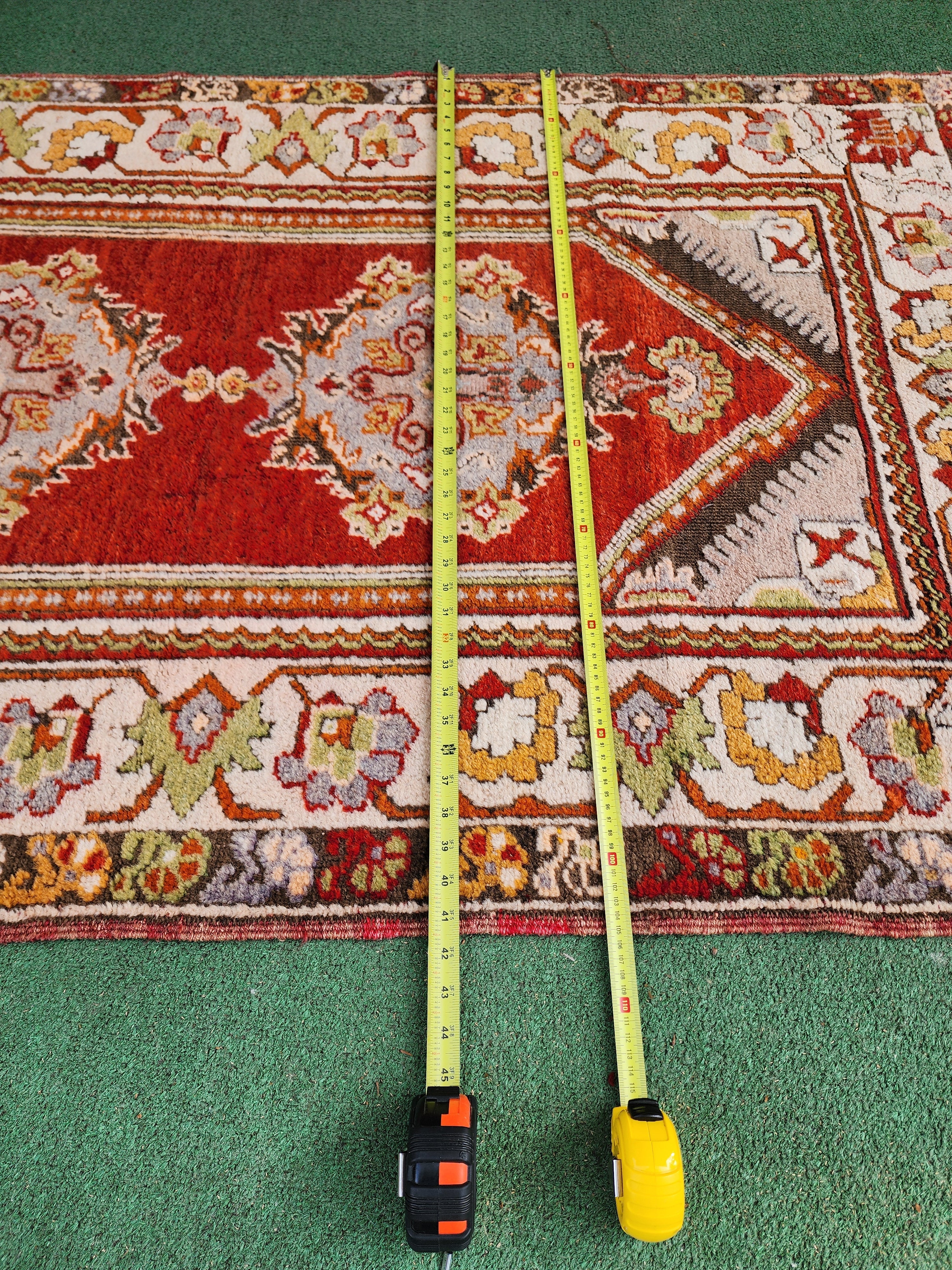 antique Milas Small Rug — styled view
