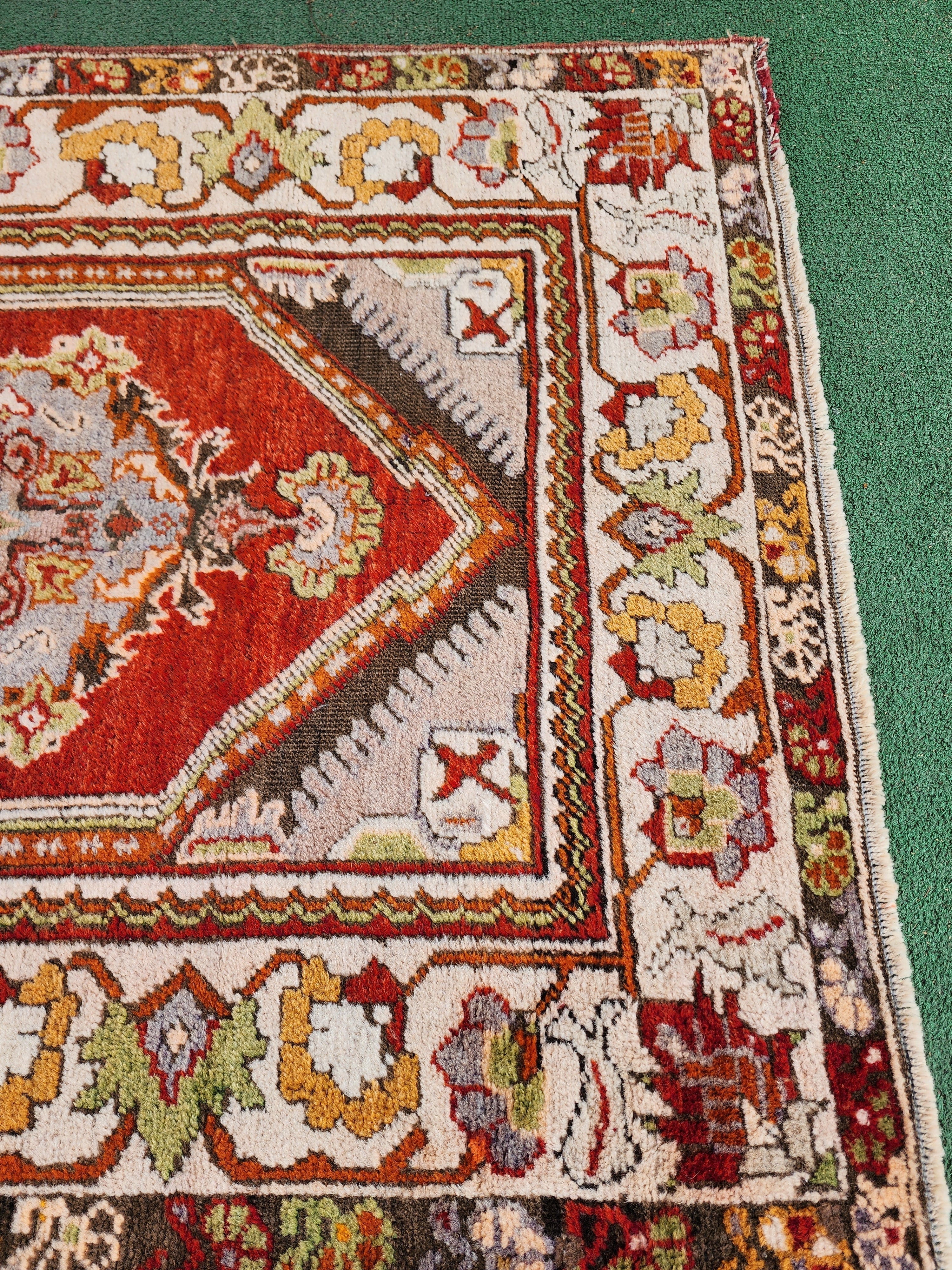antique Milas Small Rug — corner detail