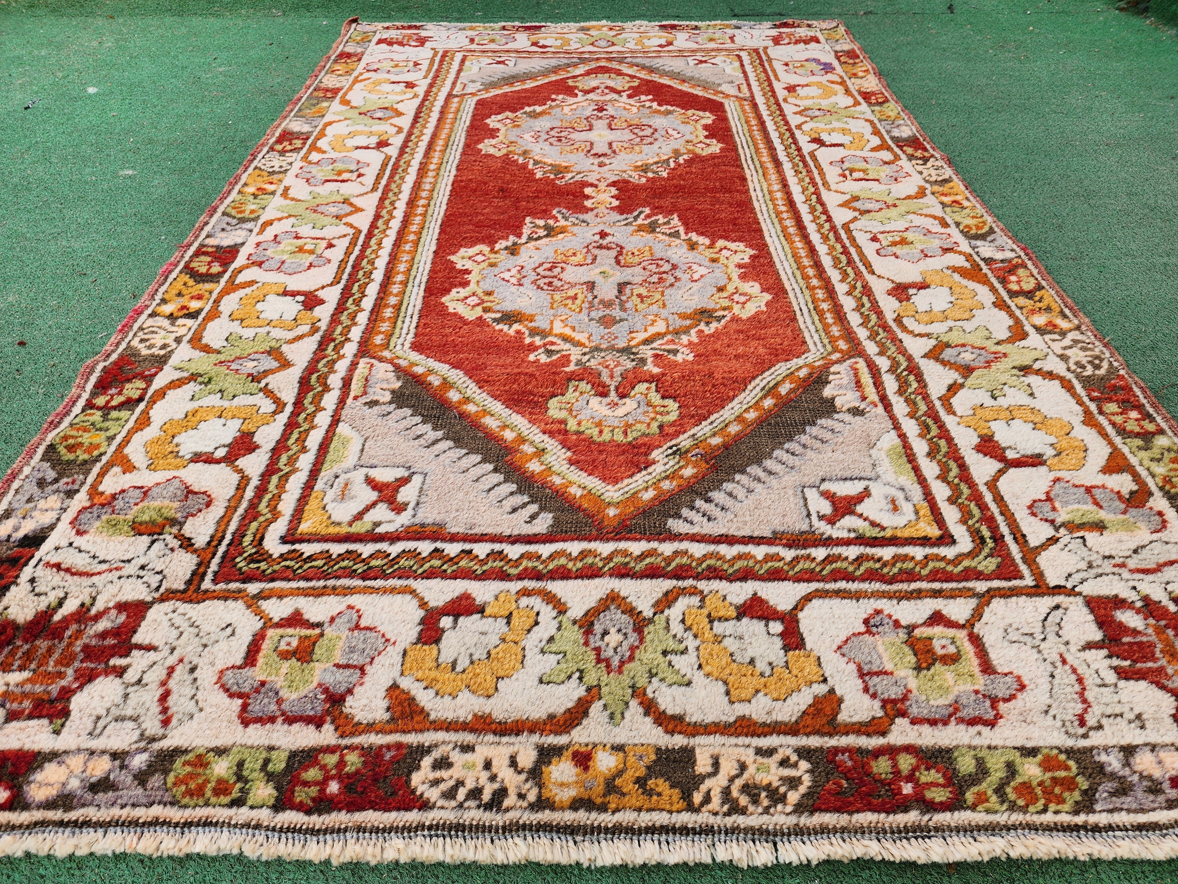 antique Milas Small Rug — border pattern