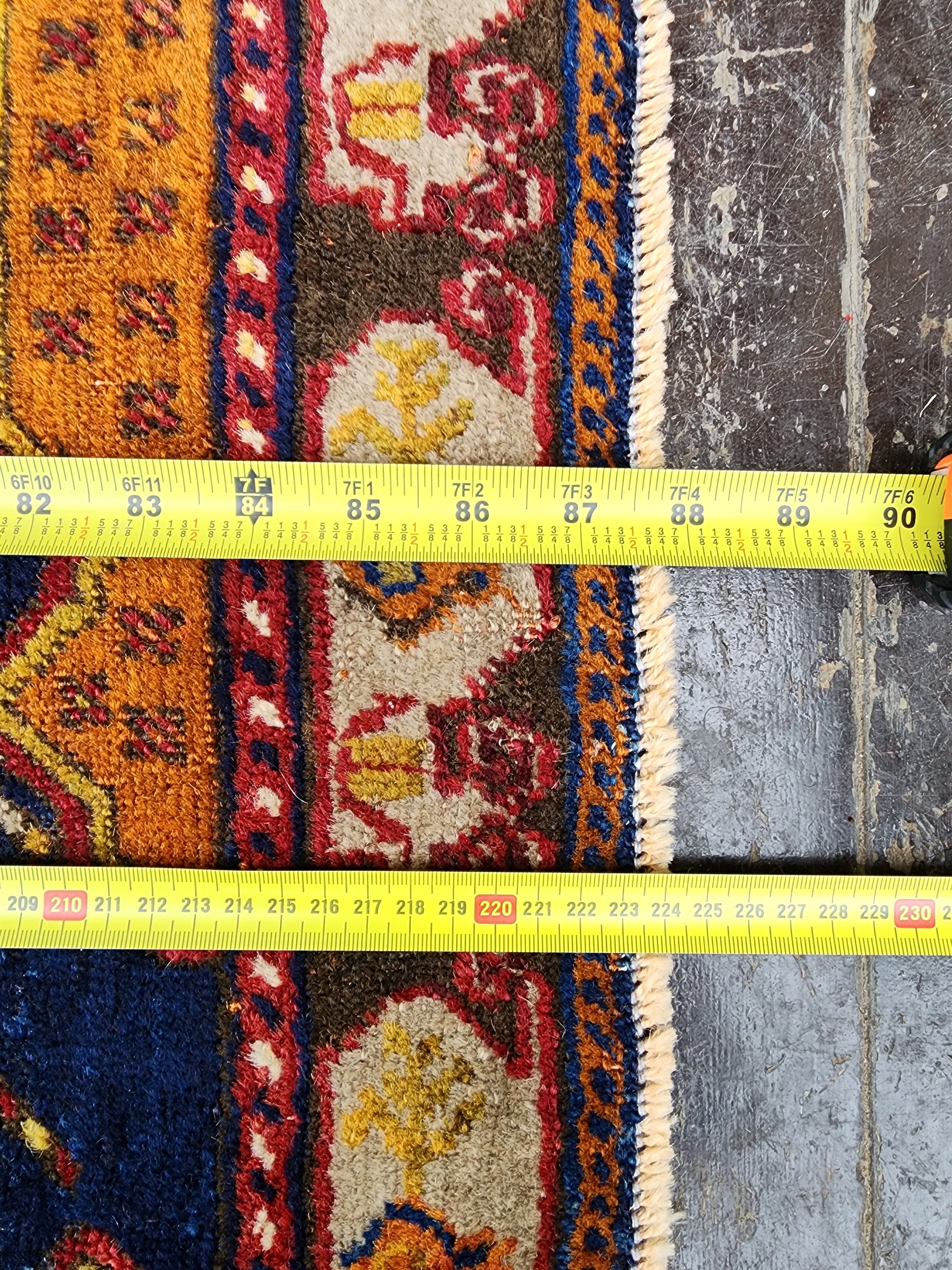 antique Turkish Wool Area Rug — styled view