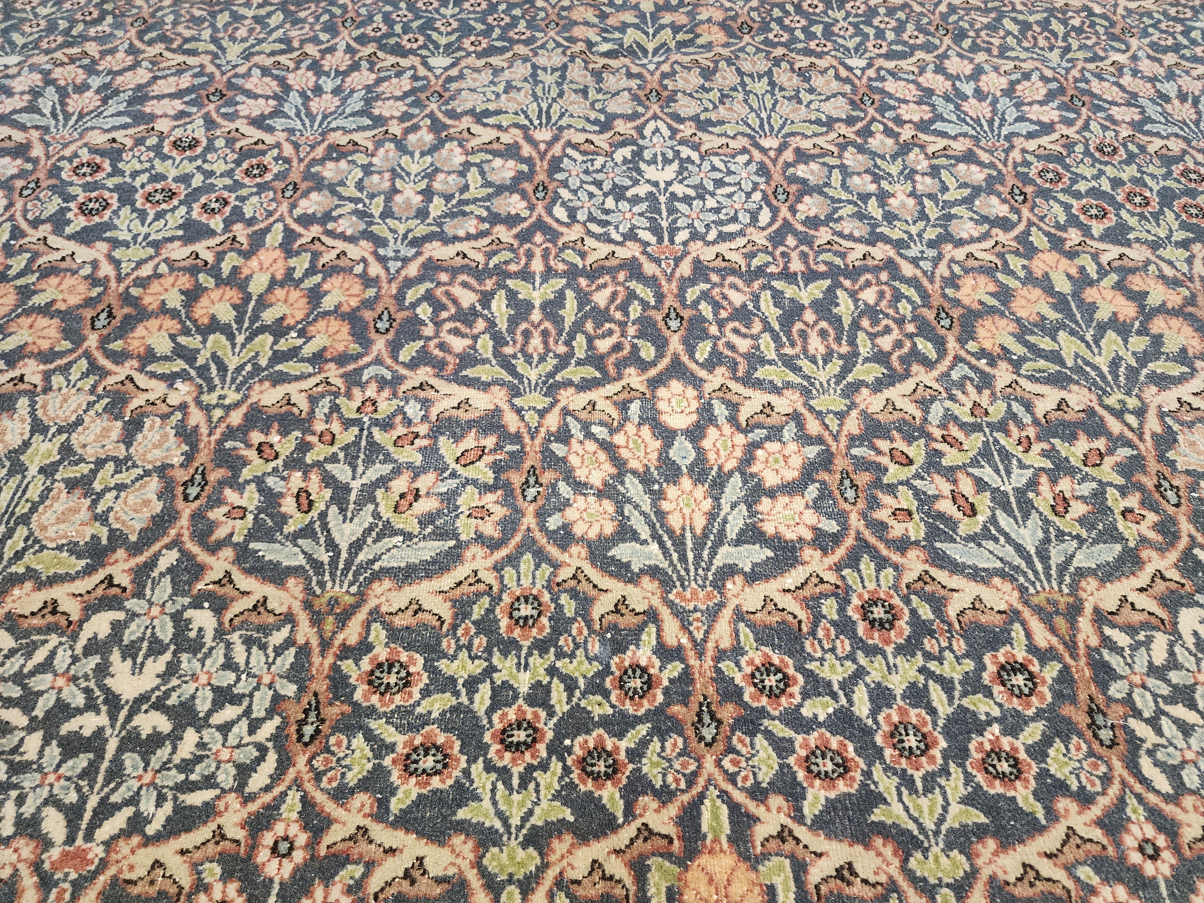 antique Hereke Wool Area Rug — styled view