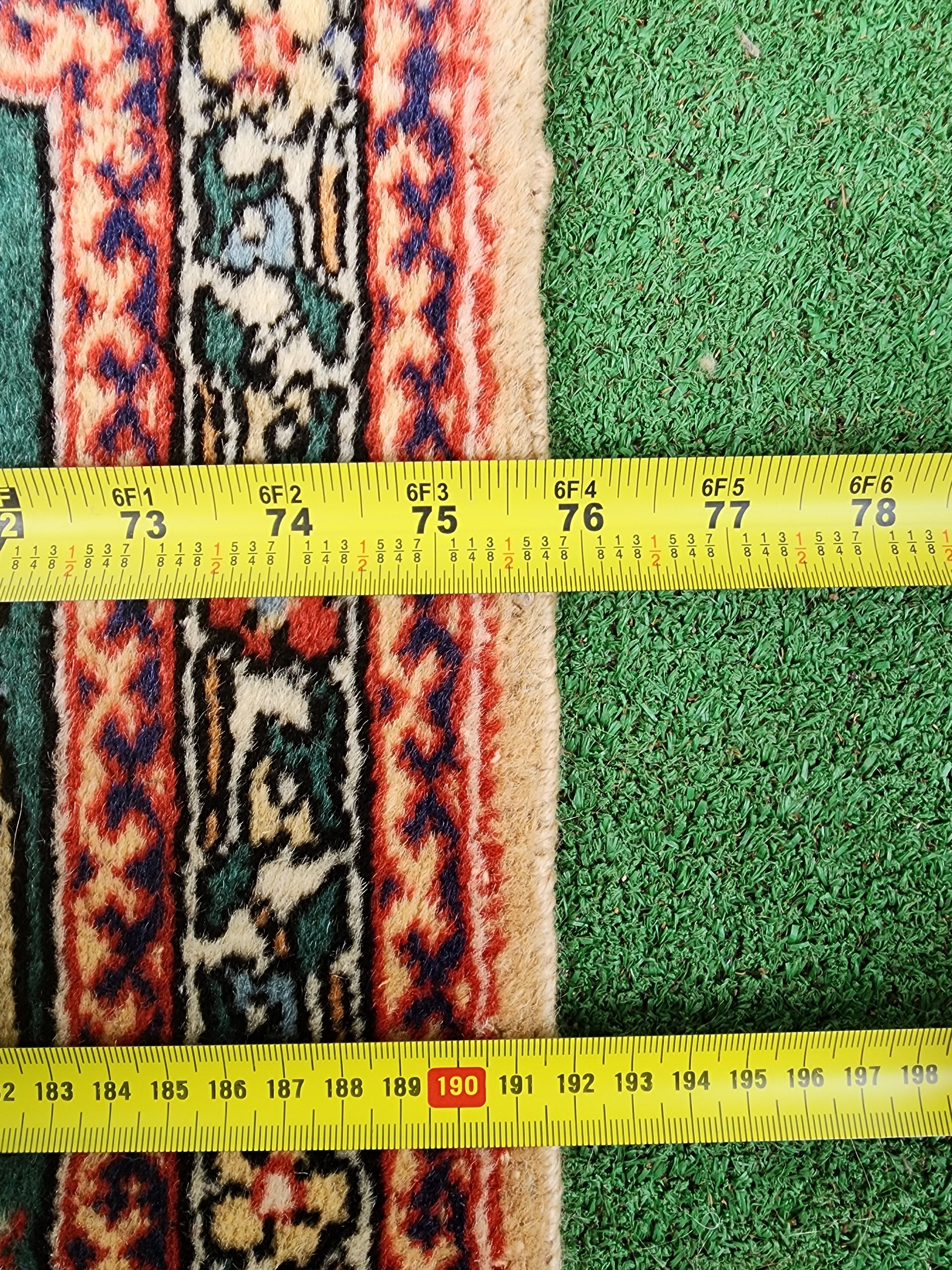 antique Hereke Wool Large Area Rug — styled view