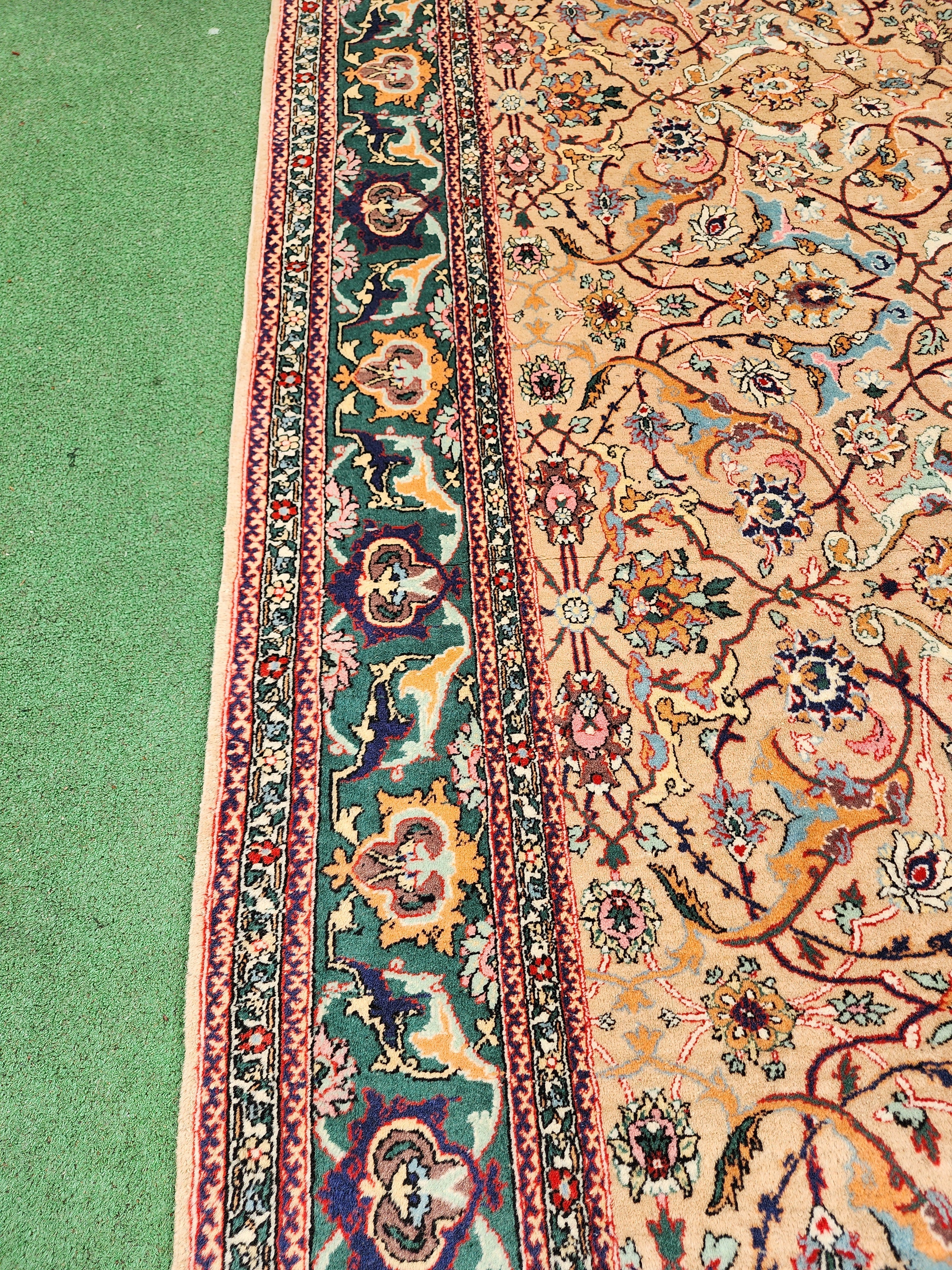 antique Hereke Wool Large Area Rug — in setting