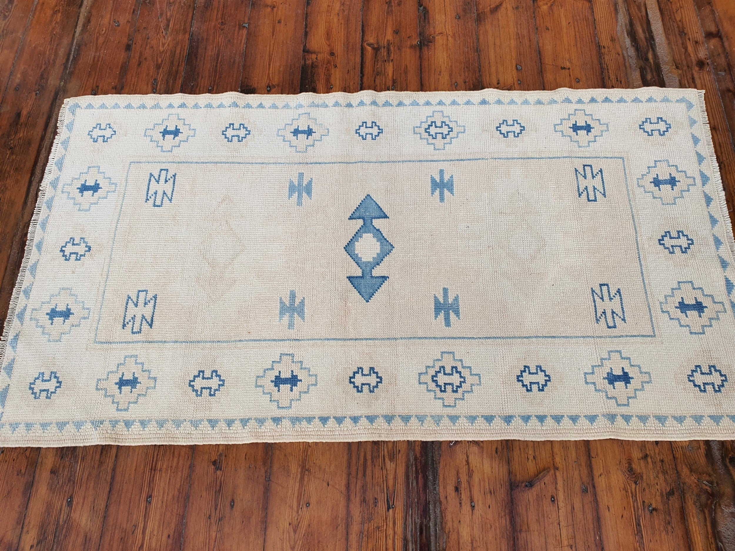 antique Oushak Wool Small Rug — in setting