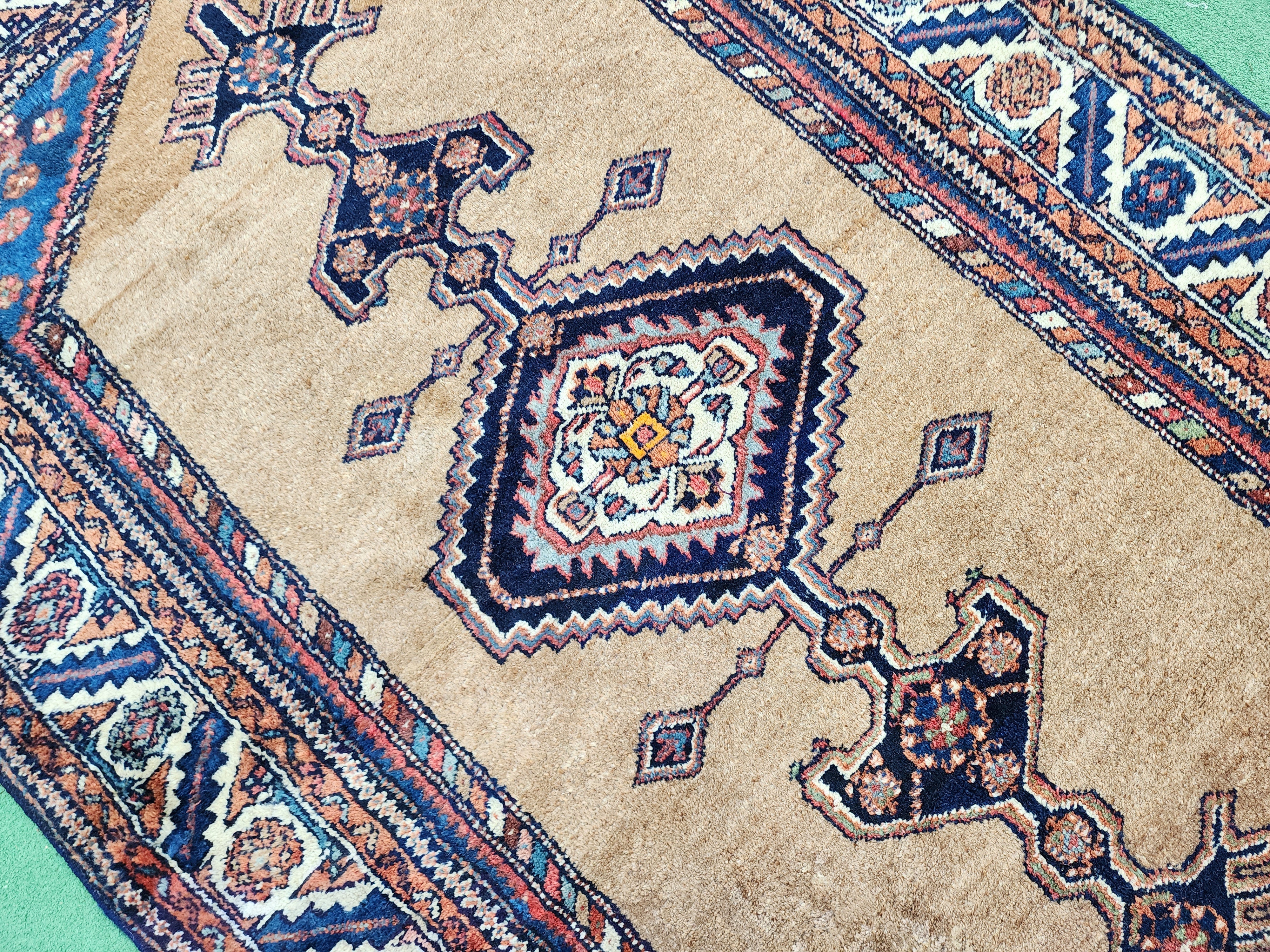 antique Persian Wool Small Rug — in setting