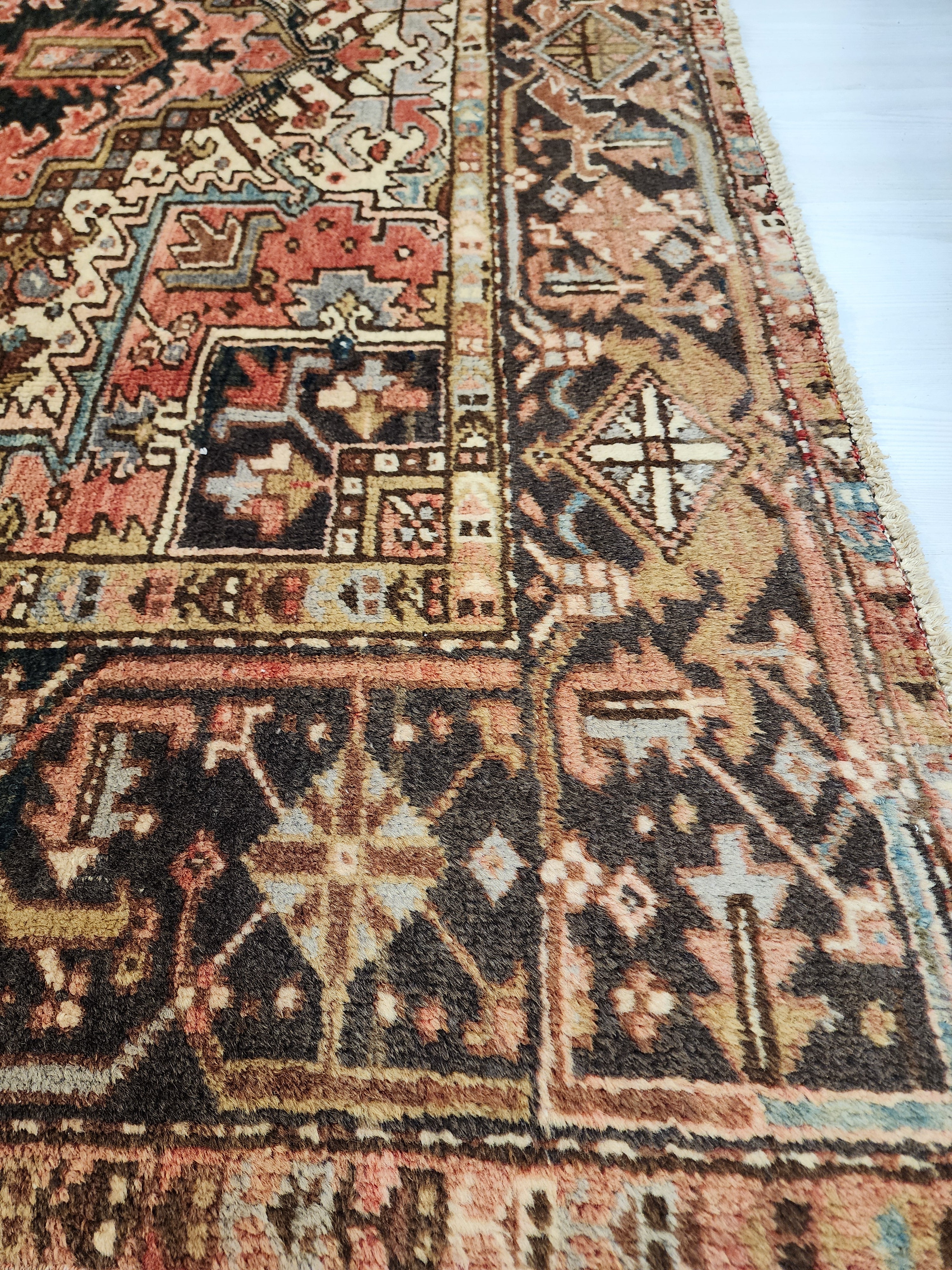 Vintage Persian Heriz Area Rug: Soft Red Oriental Design, 9'6'' x 6'9''