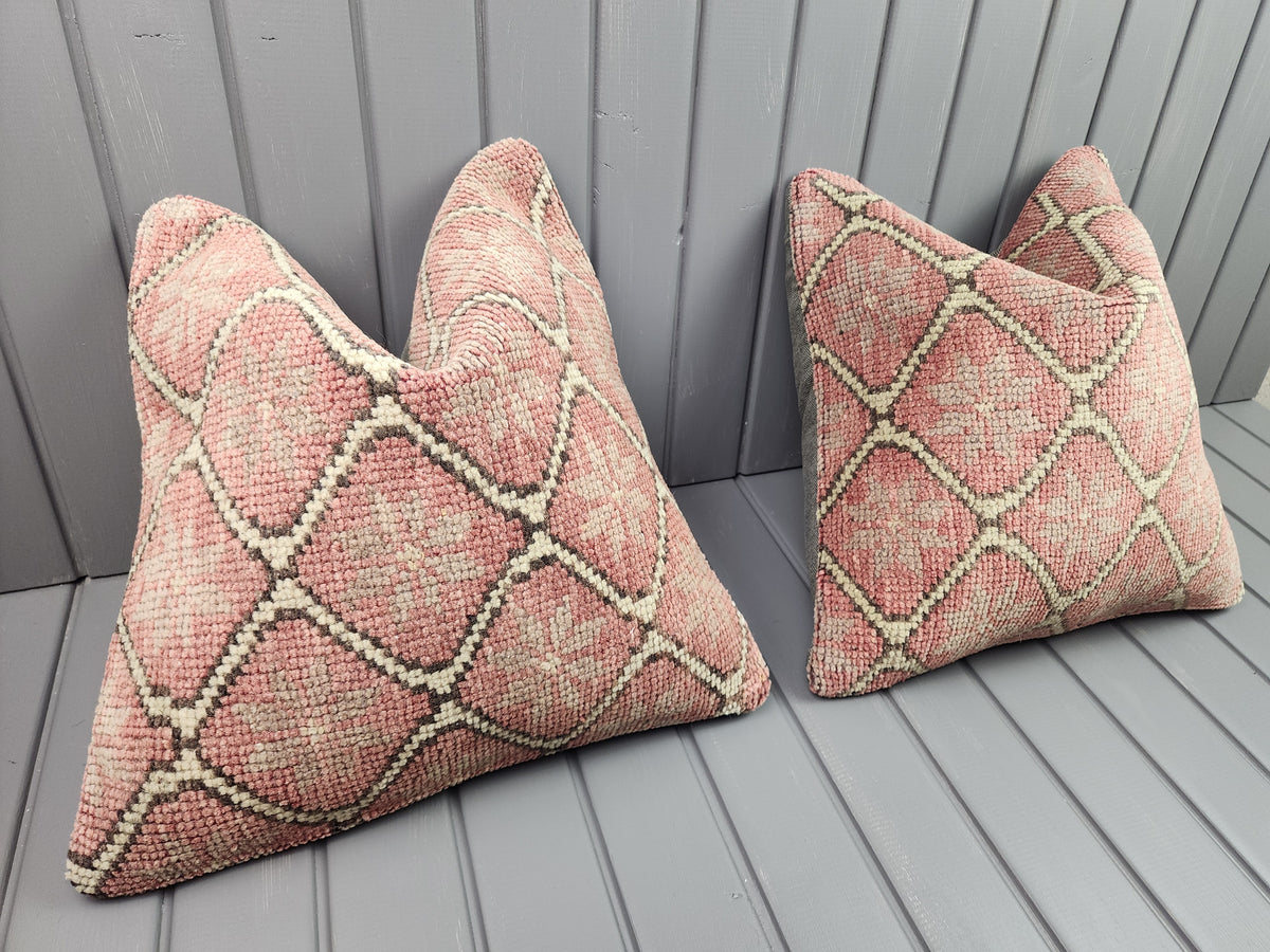 Vintage Oushak rug pillow covers, set of 2, pink, 16x16 in, pair, angled view