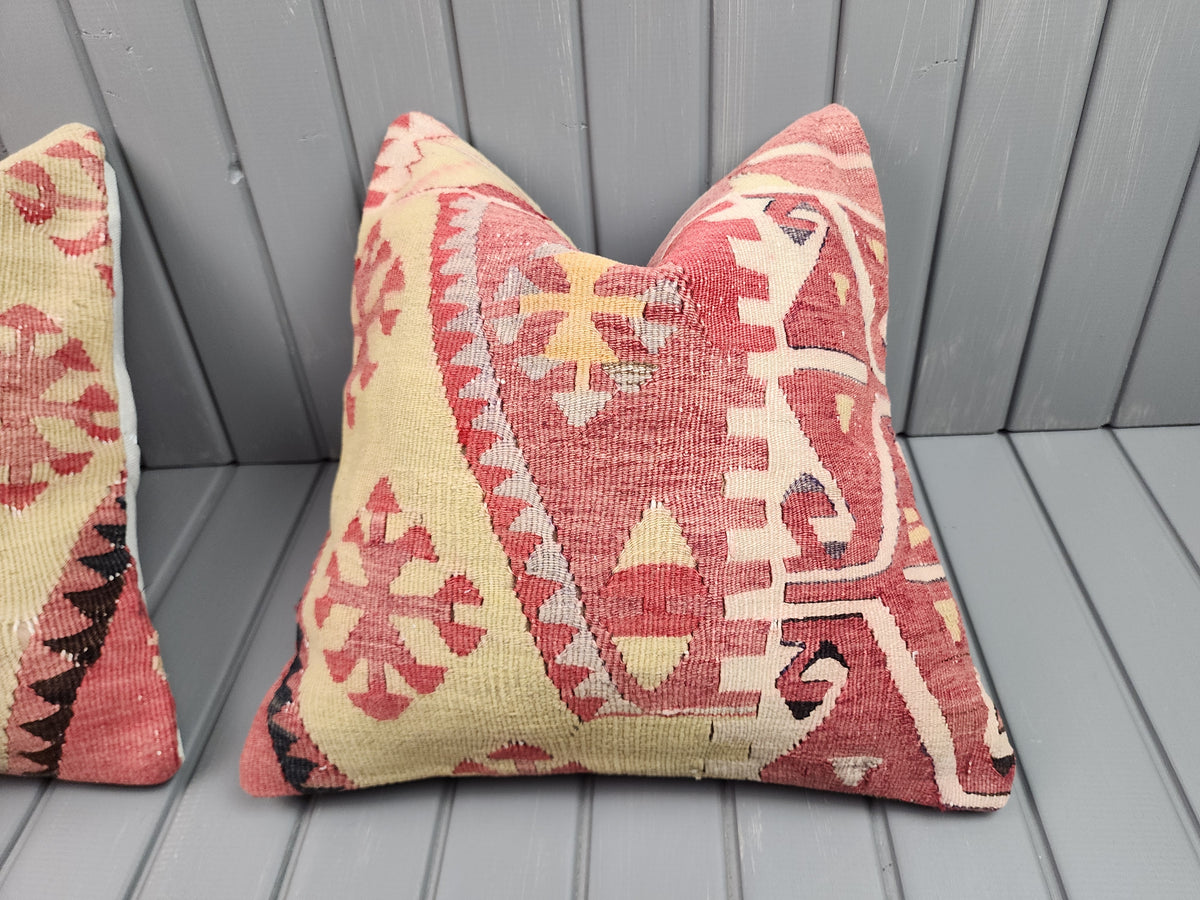 Vintage Turkish kilim pillow covers, set of 2, pink and yellow, 16x16 in, single cover close-up