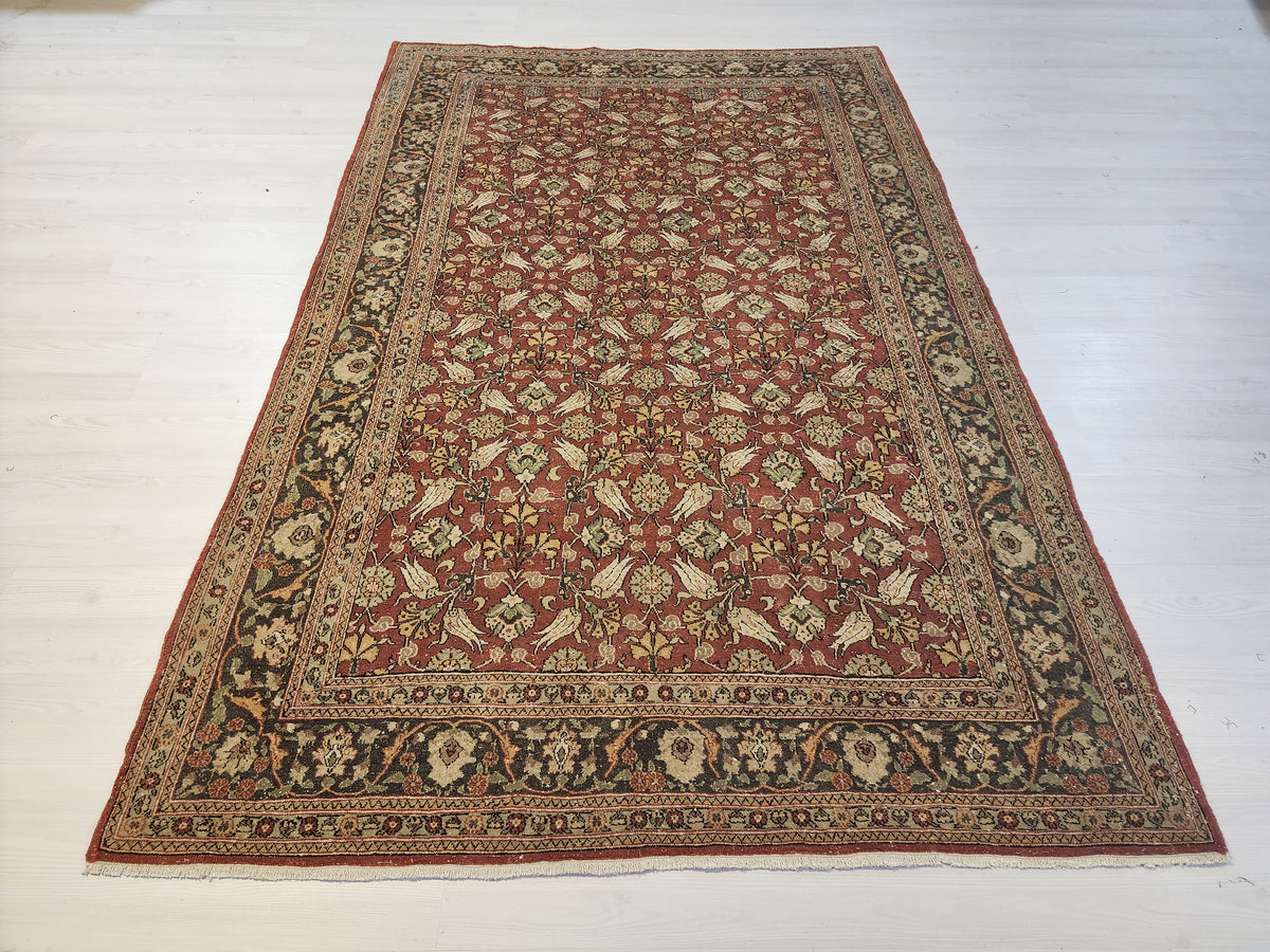 Vintage Hand-Knotted Hereke Tulip Rug, Red Floral Anatolian Carpet (5' x 7'7")