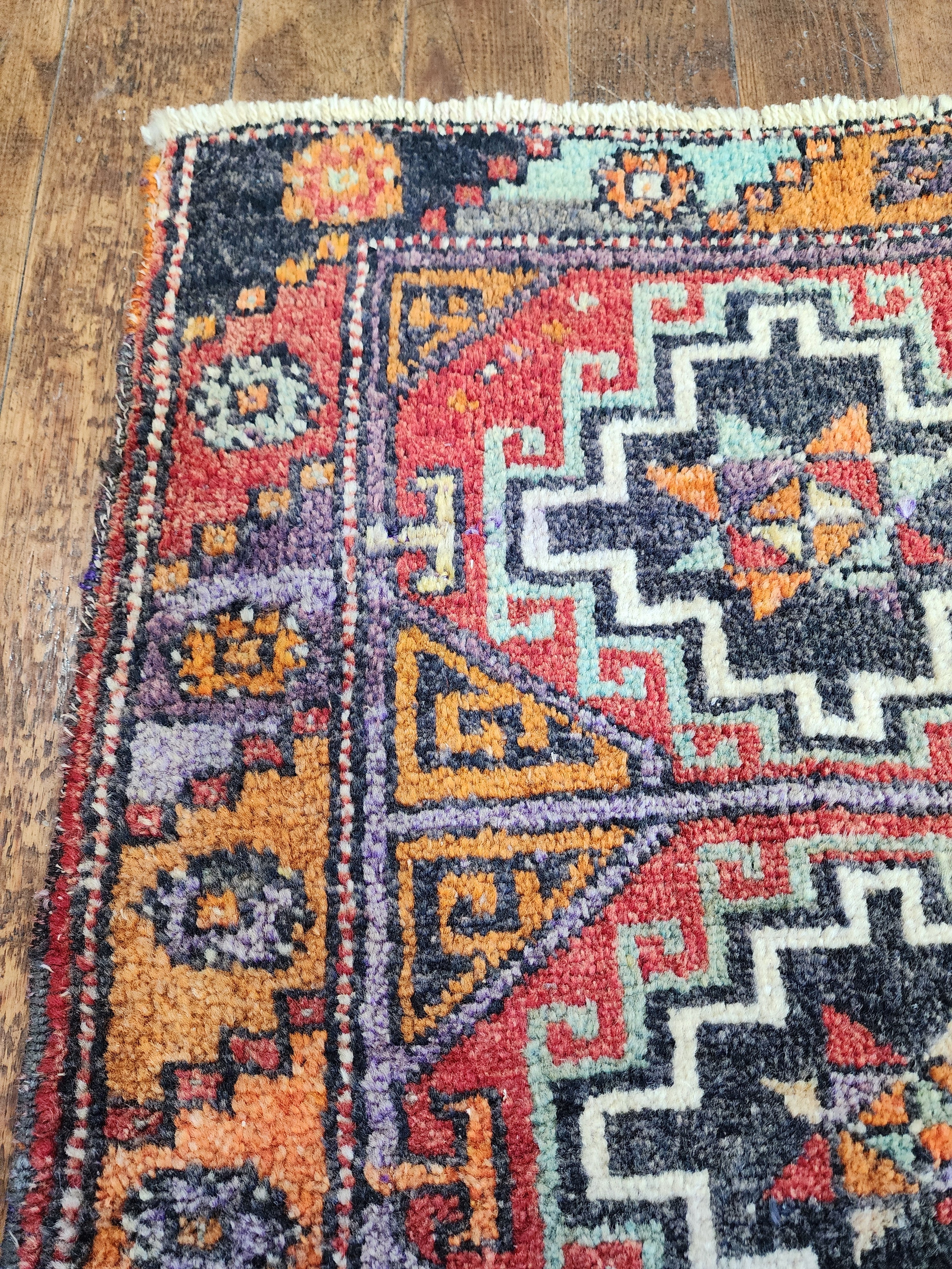 antique Konya Wool Small Rug — in setting