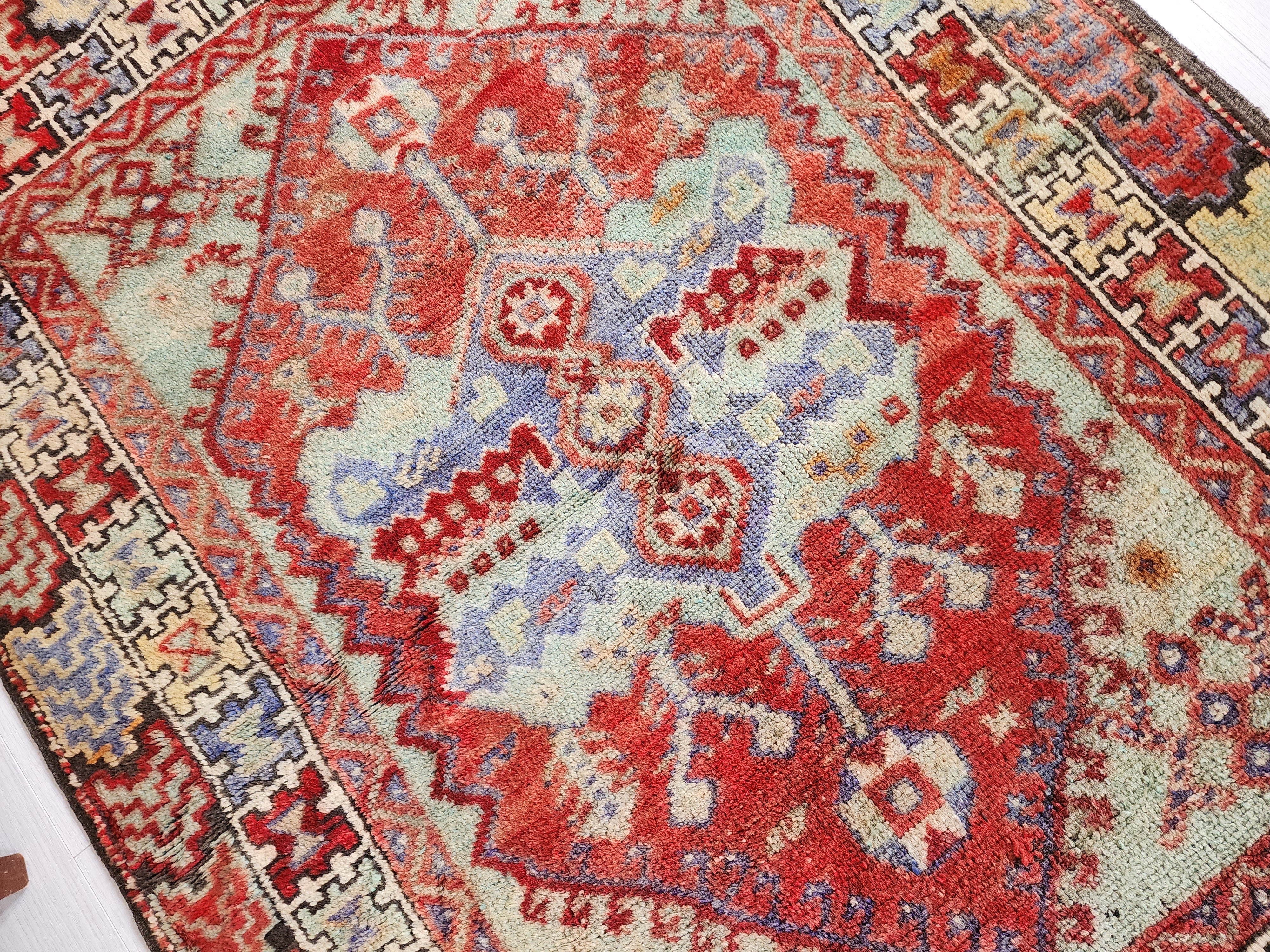 Hand-Knotted Anatolian Konya Rug with Rich Reds and Earthy Tones