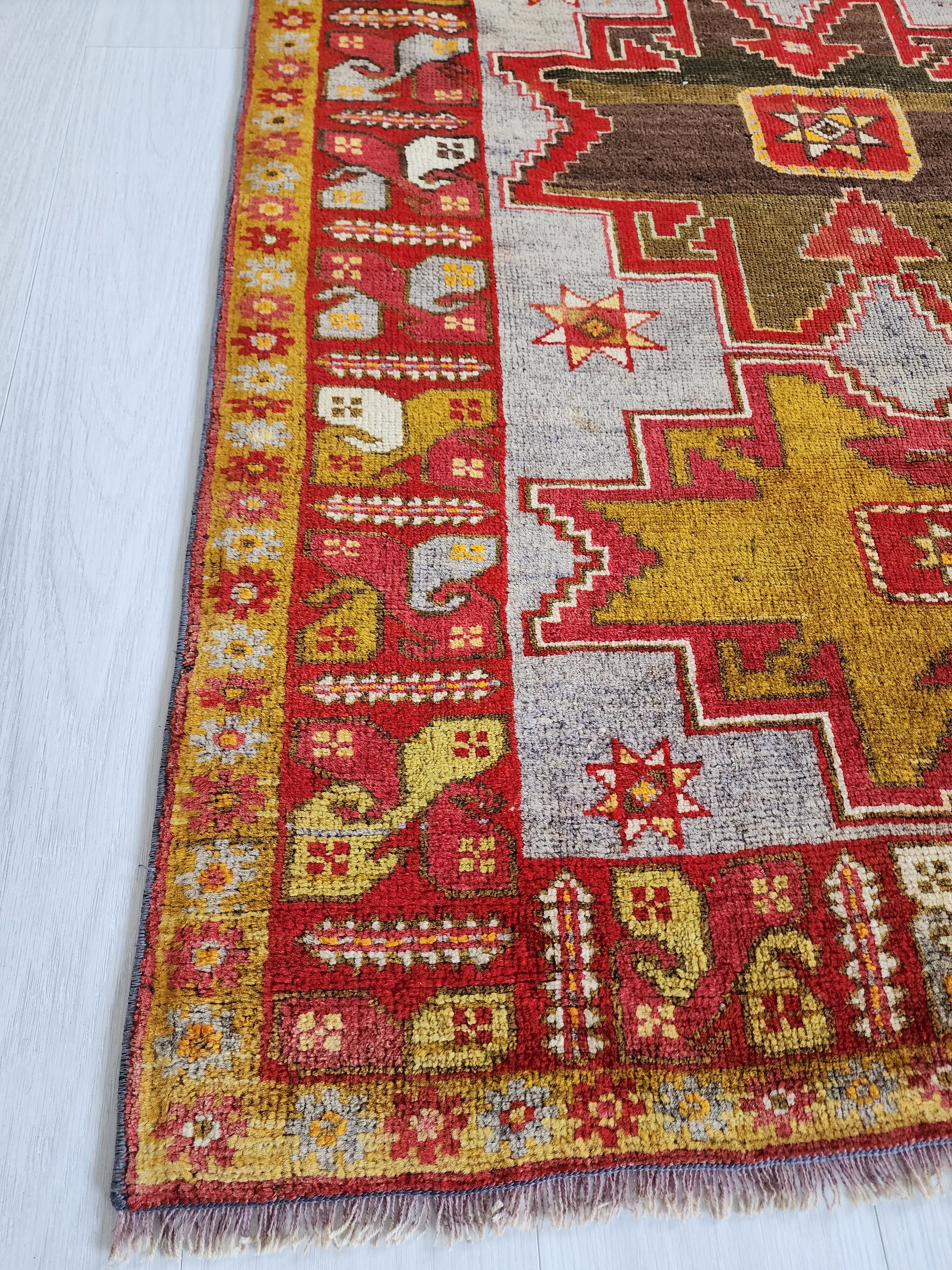 Antique Turkish Konya Rug with Tribal Bird Border – A Masterpiece of Anatolian Folk Art