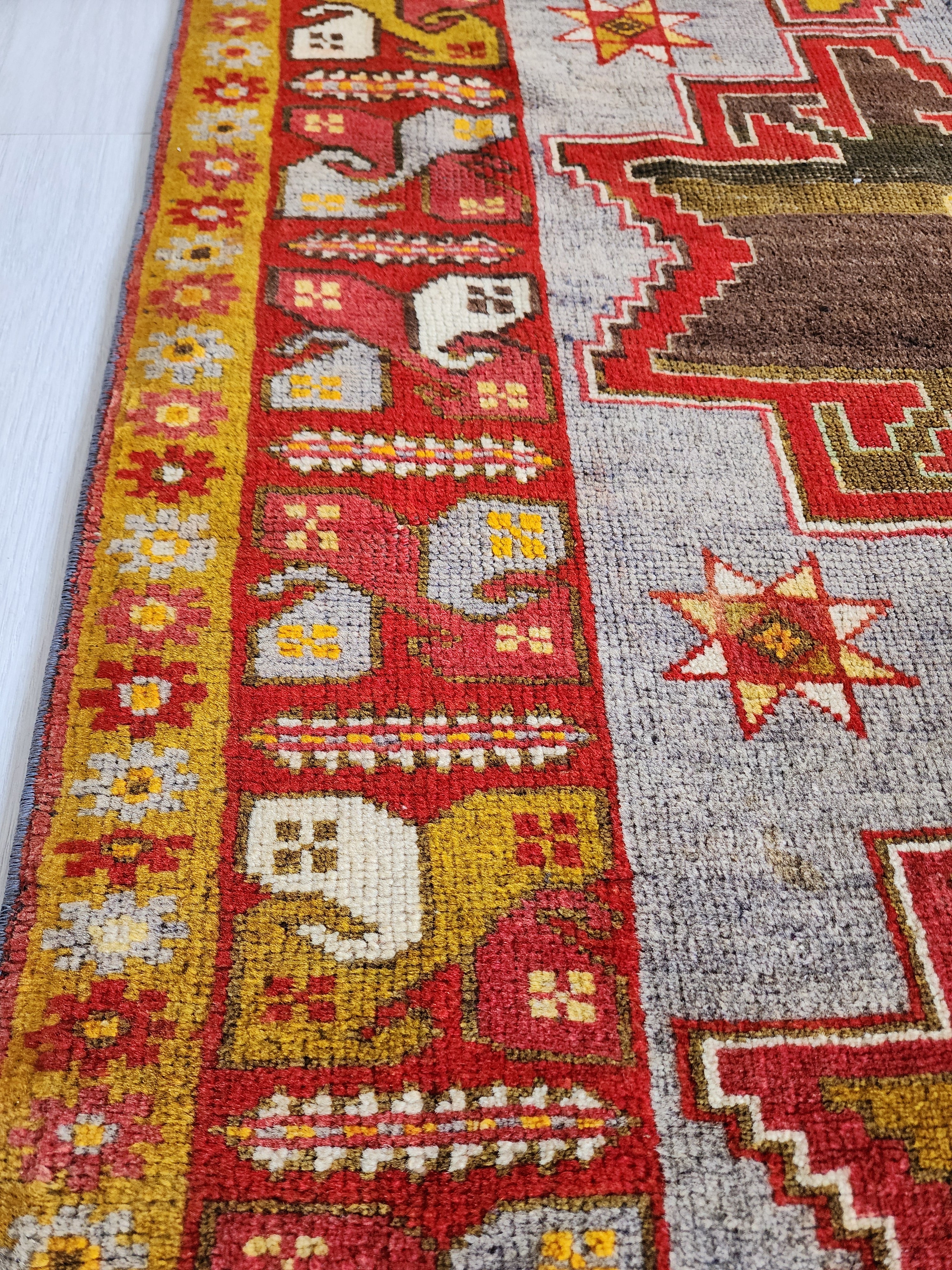 Antique Turkish Konya Rug with Tribal Bird Border – A Masterpiece of Anatolian Folk Art