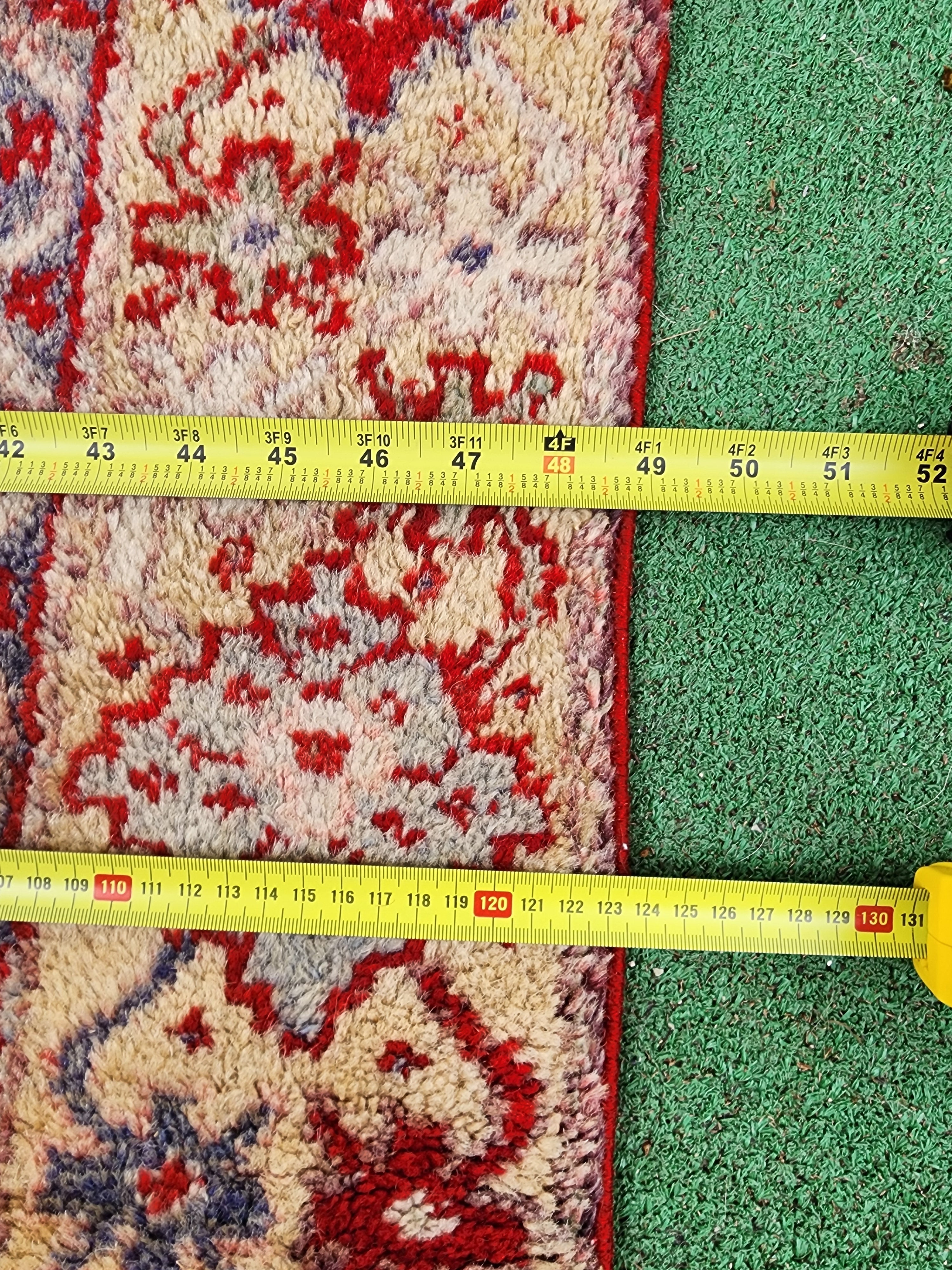 antique Turkish Wool Small Rug — styled view