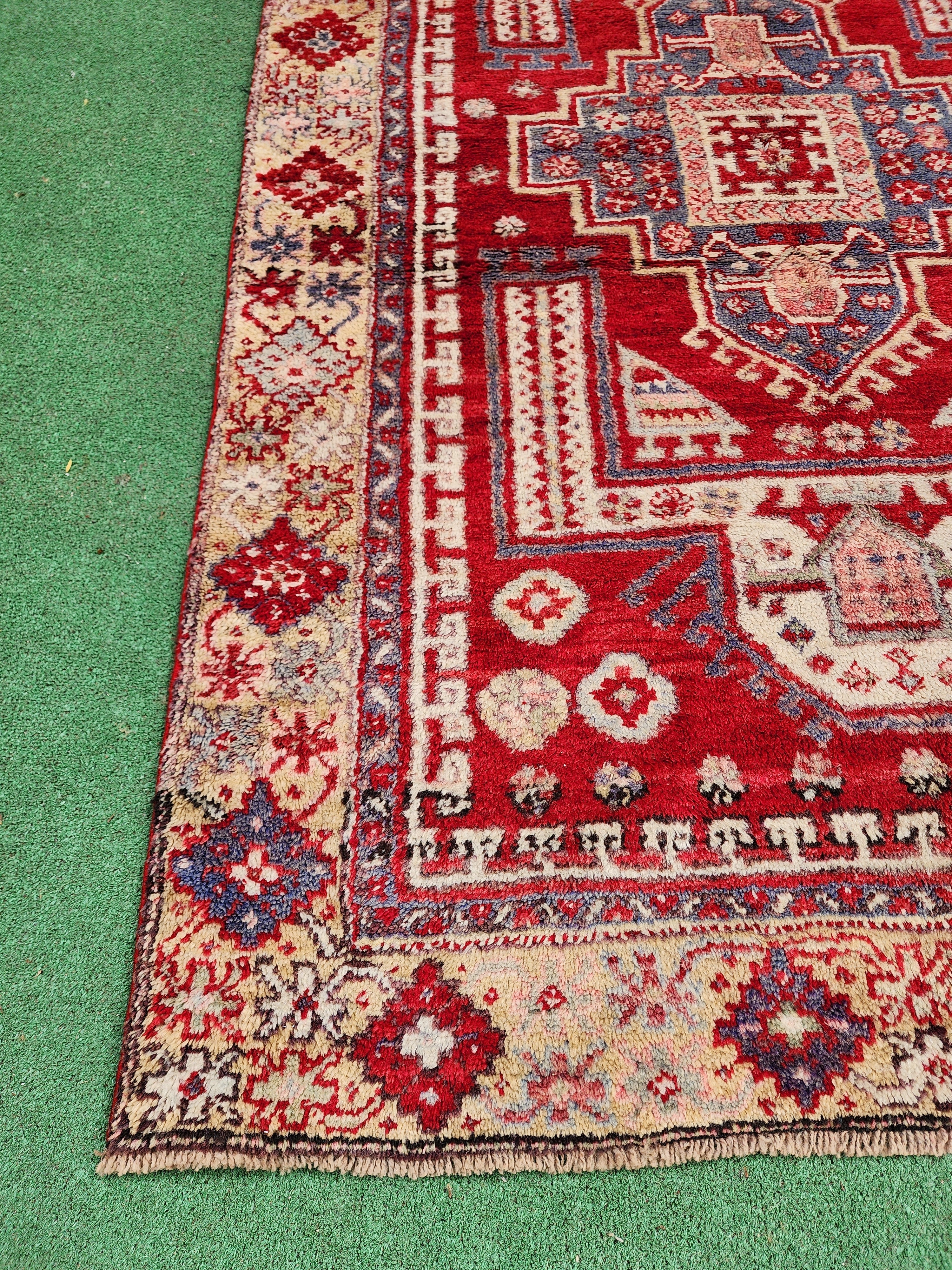 antique Turkish Wool Small Rug — in setting