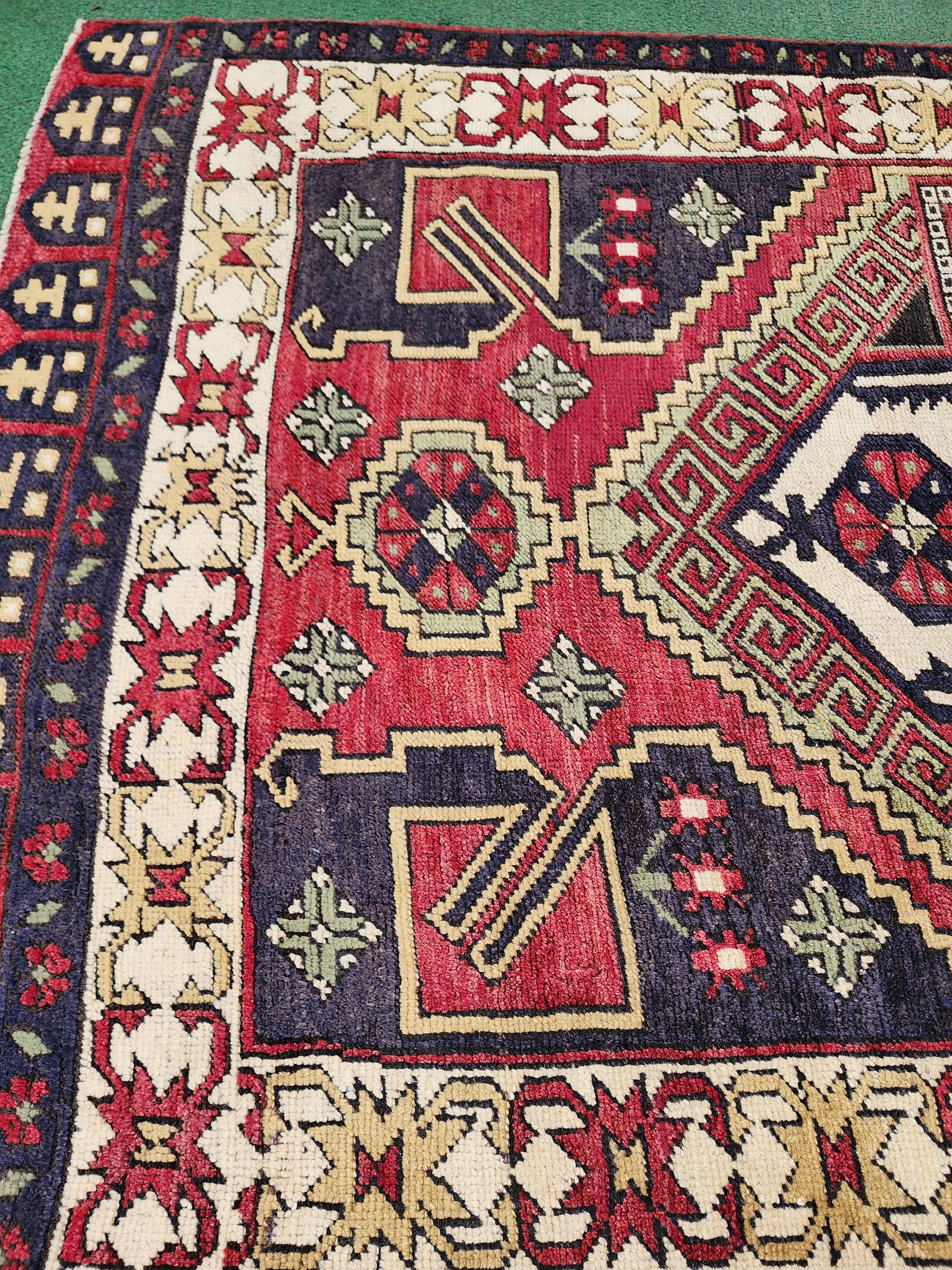 antique Konya Wool Small Rug — in setting
