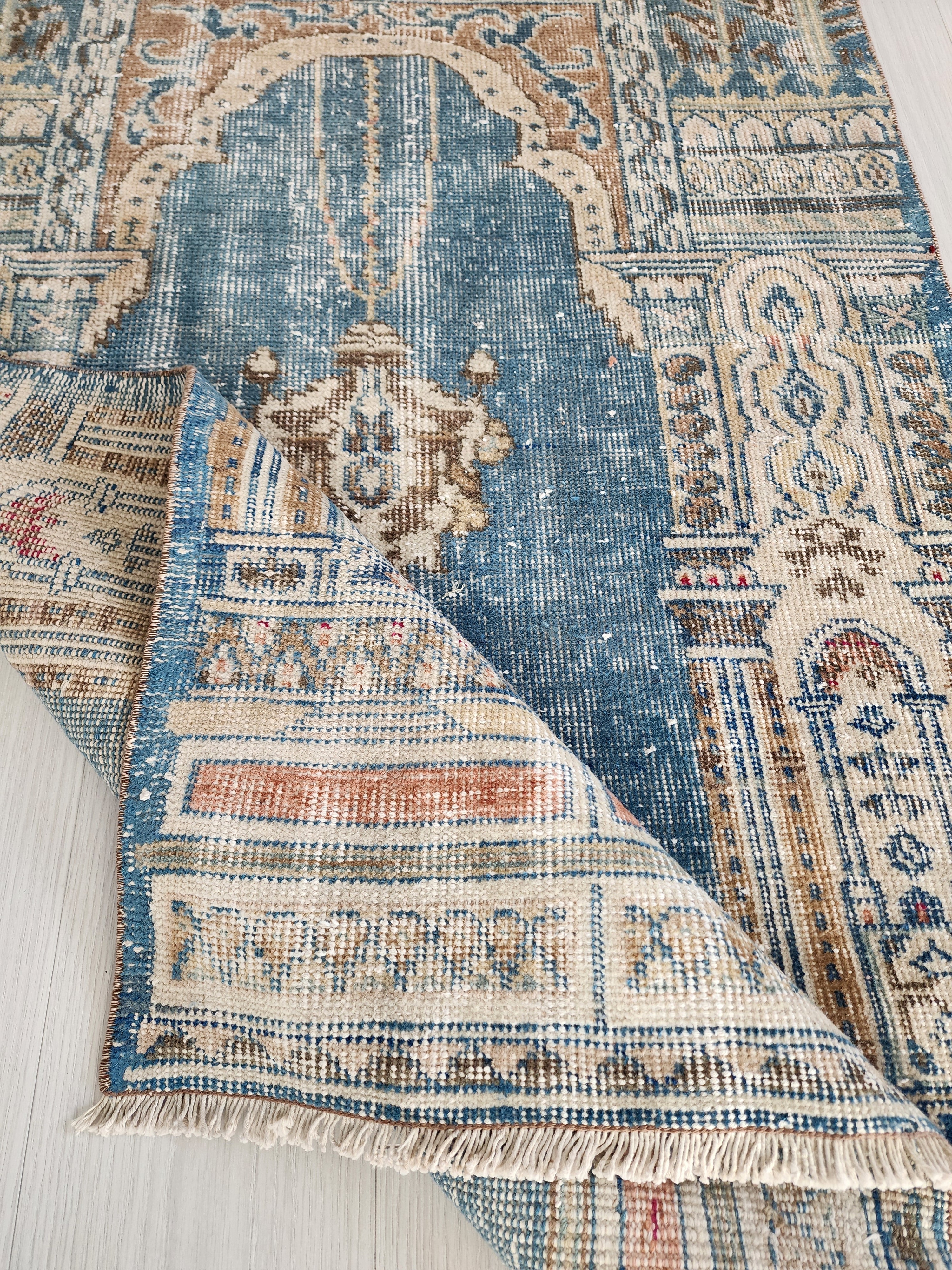 vintage Persian Wool Small Rug — styled view