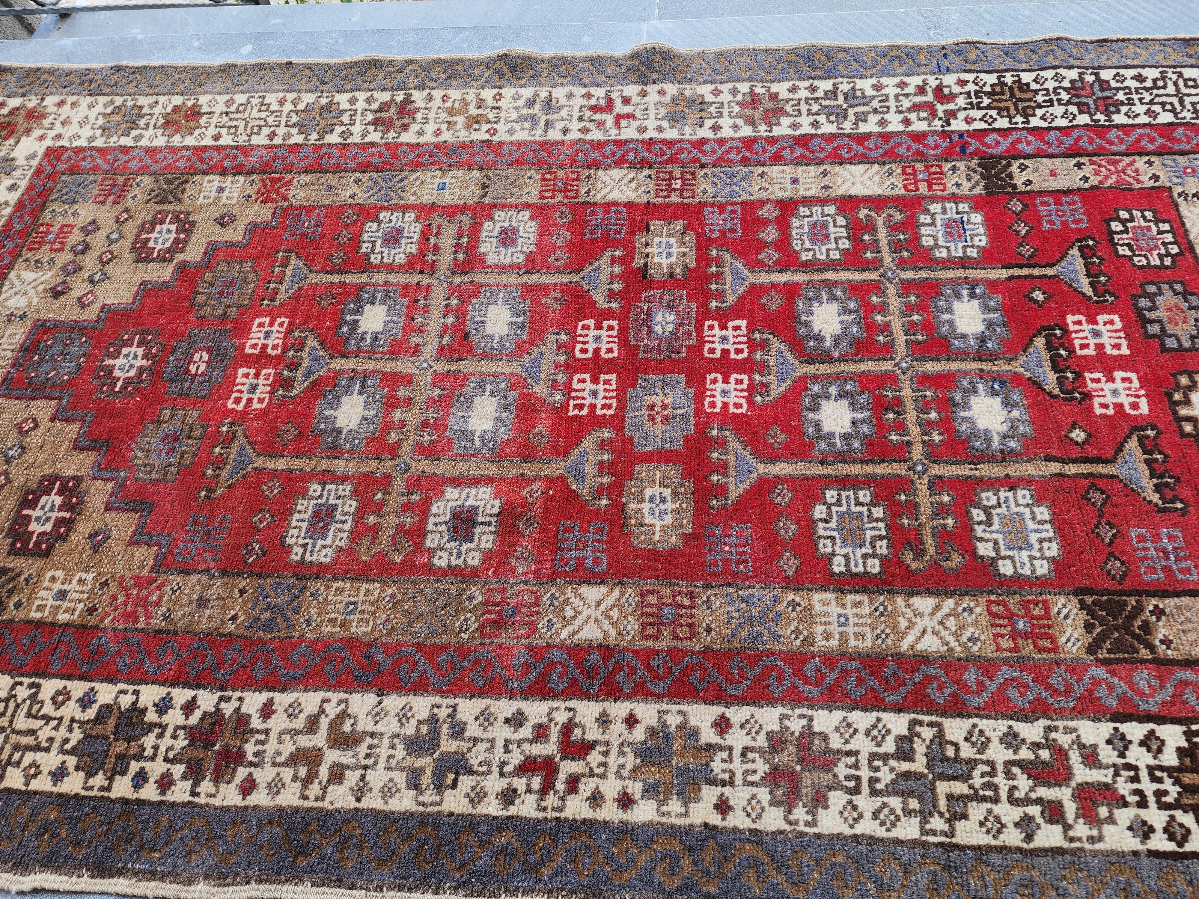 antique Turkish Wool Small Rug — in setting