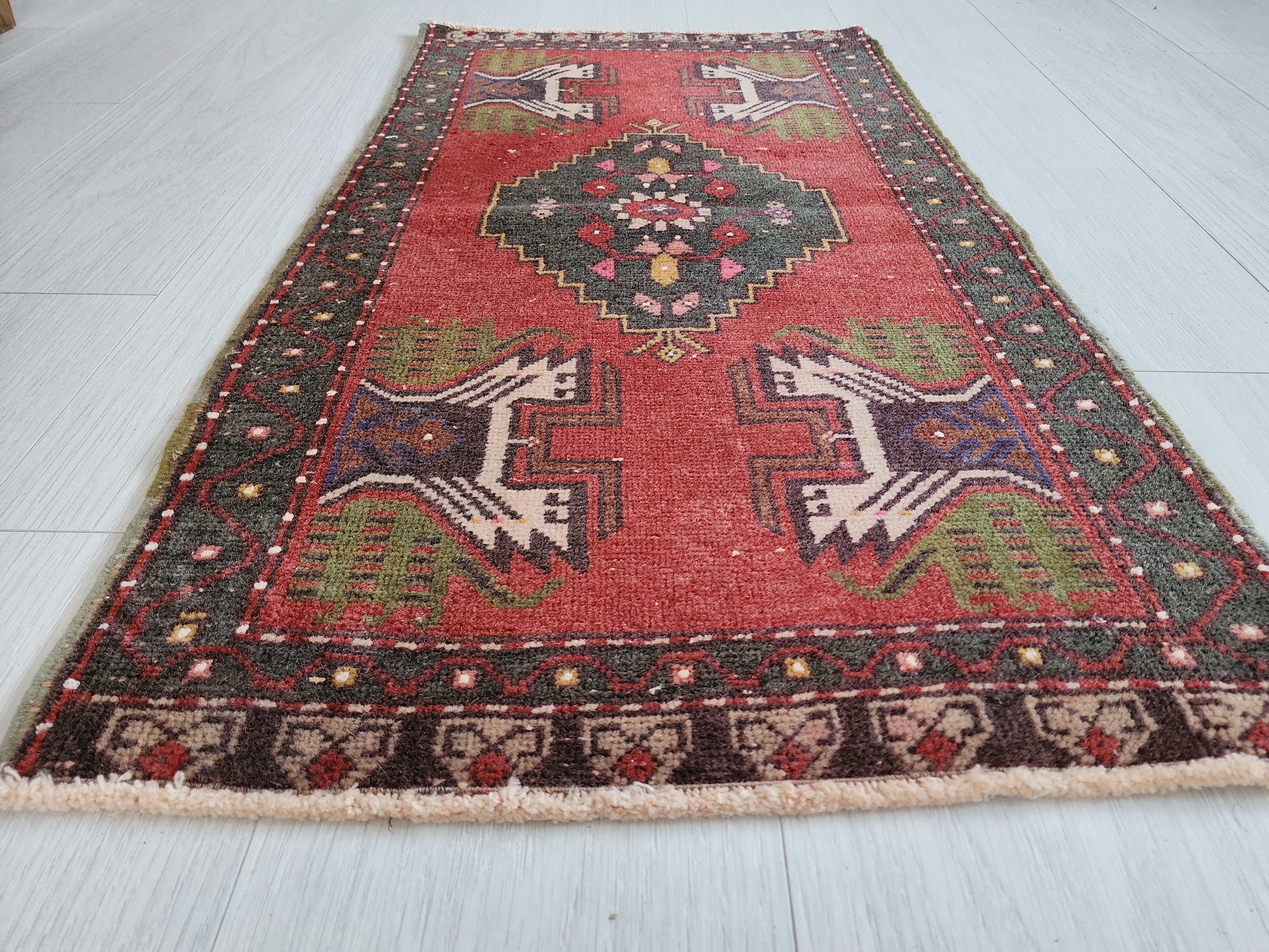 antique Oushak Small Rug — styled view