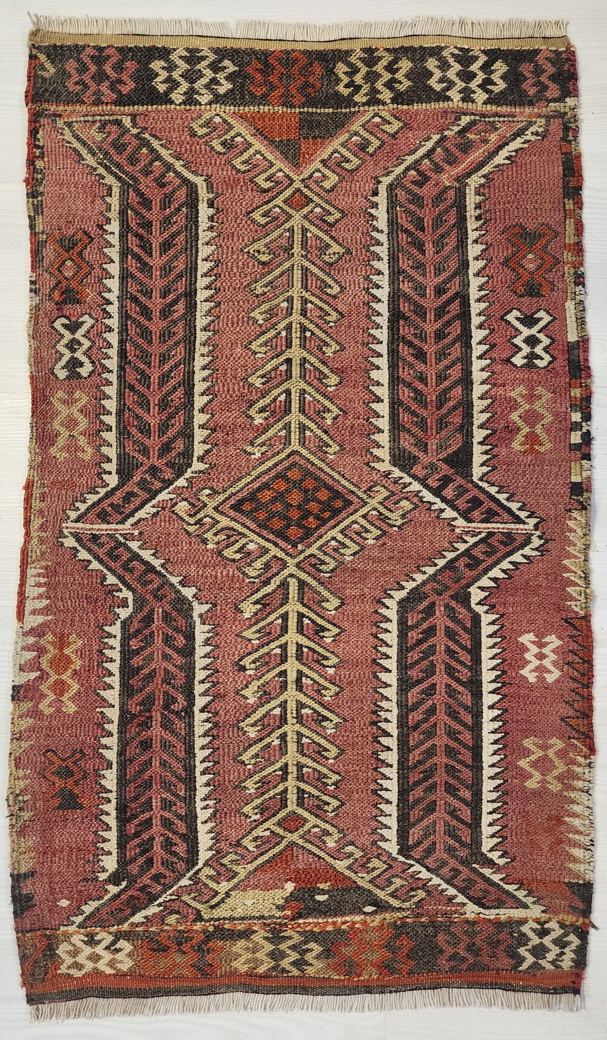 Back of a hand-knotted rug showing individual knots versus other construction types