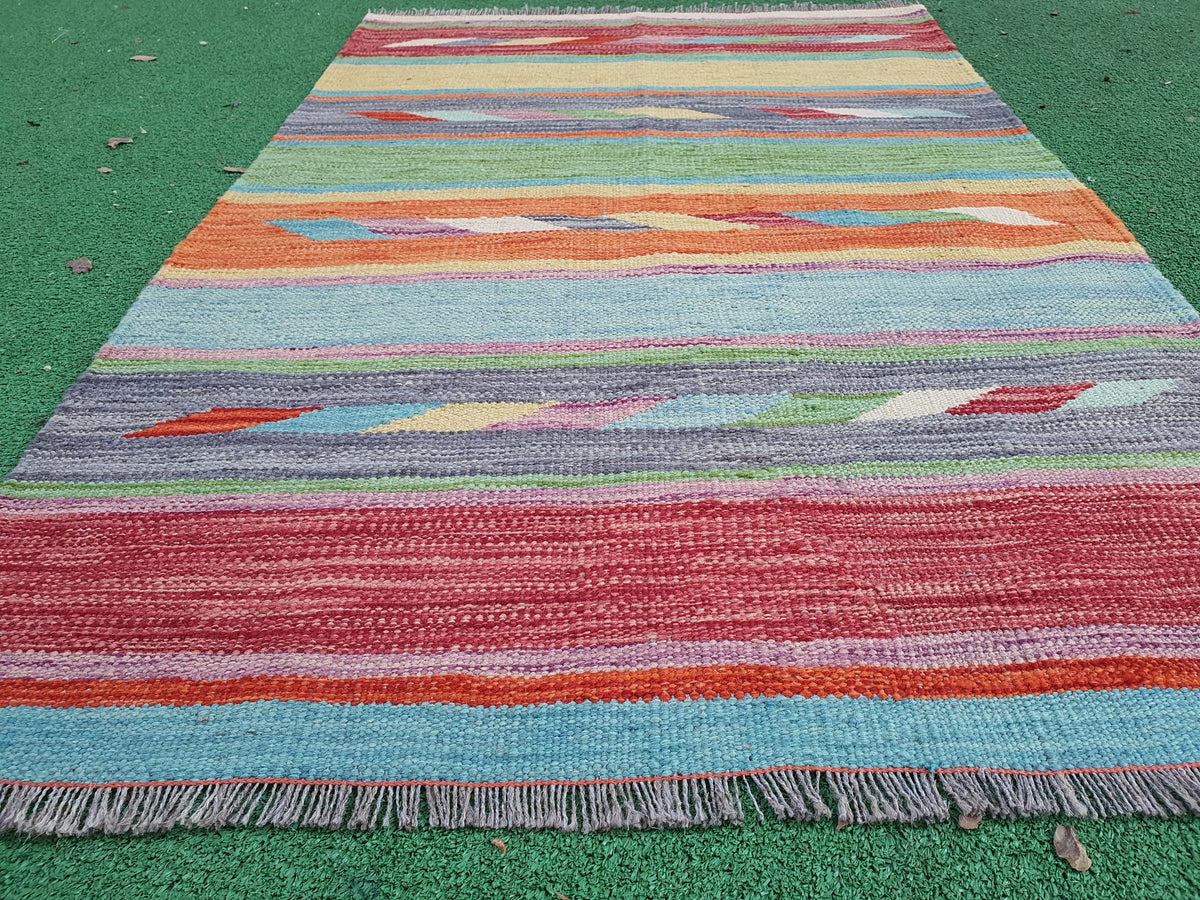Vintage Oushak rug from Anatolia — soft palette and floral medallion