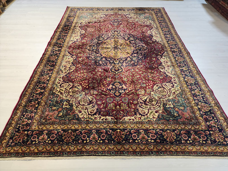 Vintage Turkish Ladik medallion rug in red, blue and beige, 7x10 ft, suited to a dining room