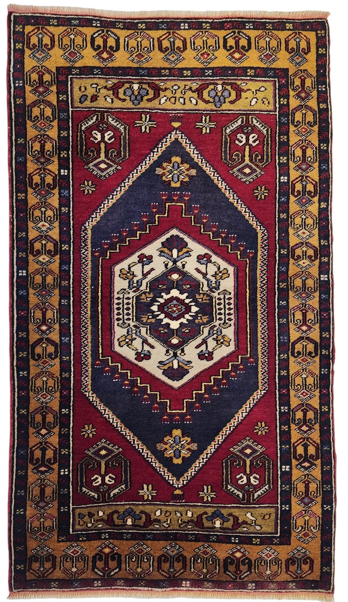 Vintage hand-knotted Yahyalı rug in red, blue and yellow